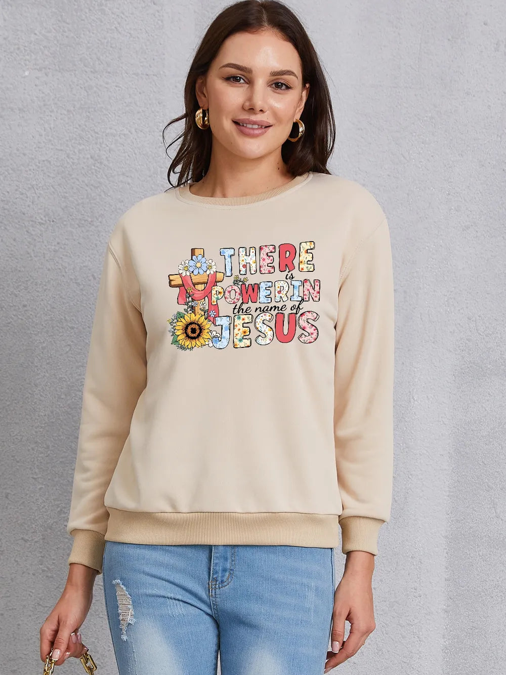 THERE IS POWER IN THE NAME OF JESUS Round Neck Sweatshirt
