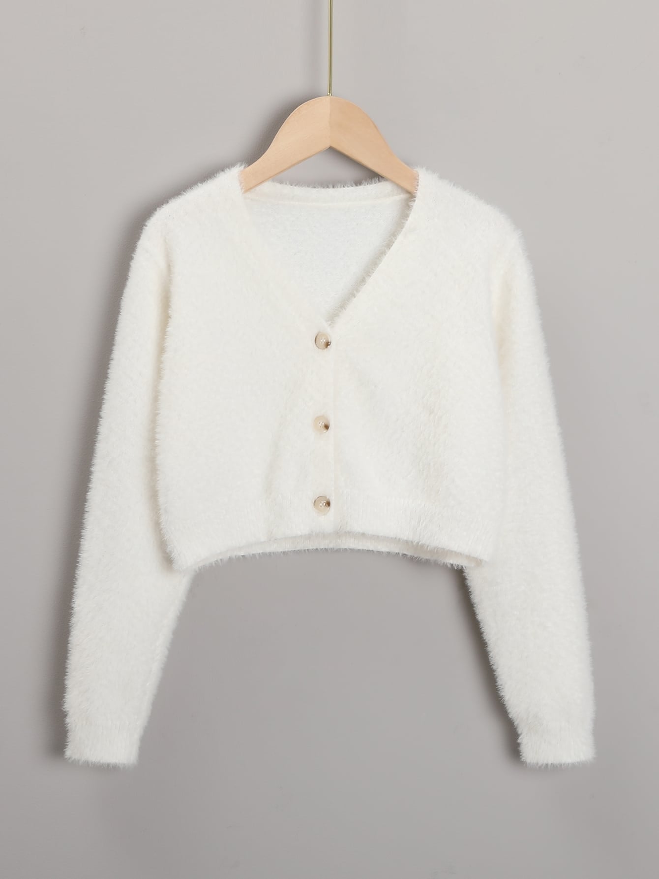 New Fall/Winter Cardigan For Tween Girls. Unique Design With Fluffy Texture Shows The Girl's Unique And Fashionable Taste. The White Color Highlights The Natural And Fresh Features, Which Can Be Paired With Various Clothes, Including T-Shirts, Vests, Cami