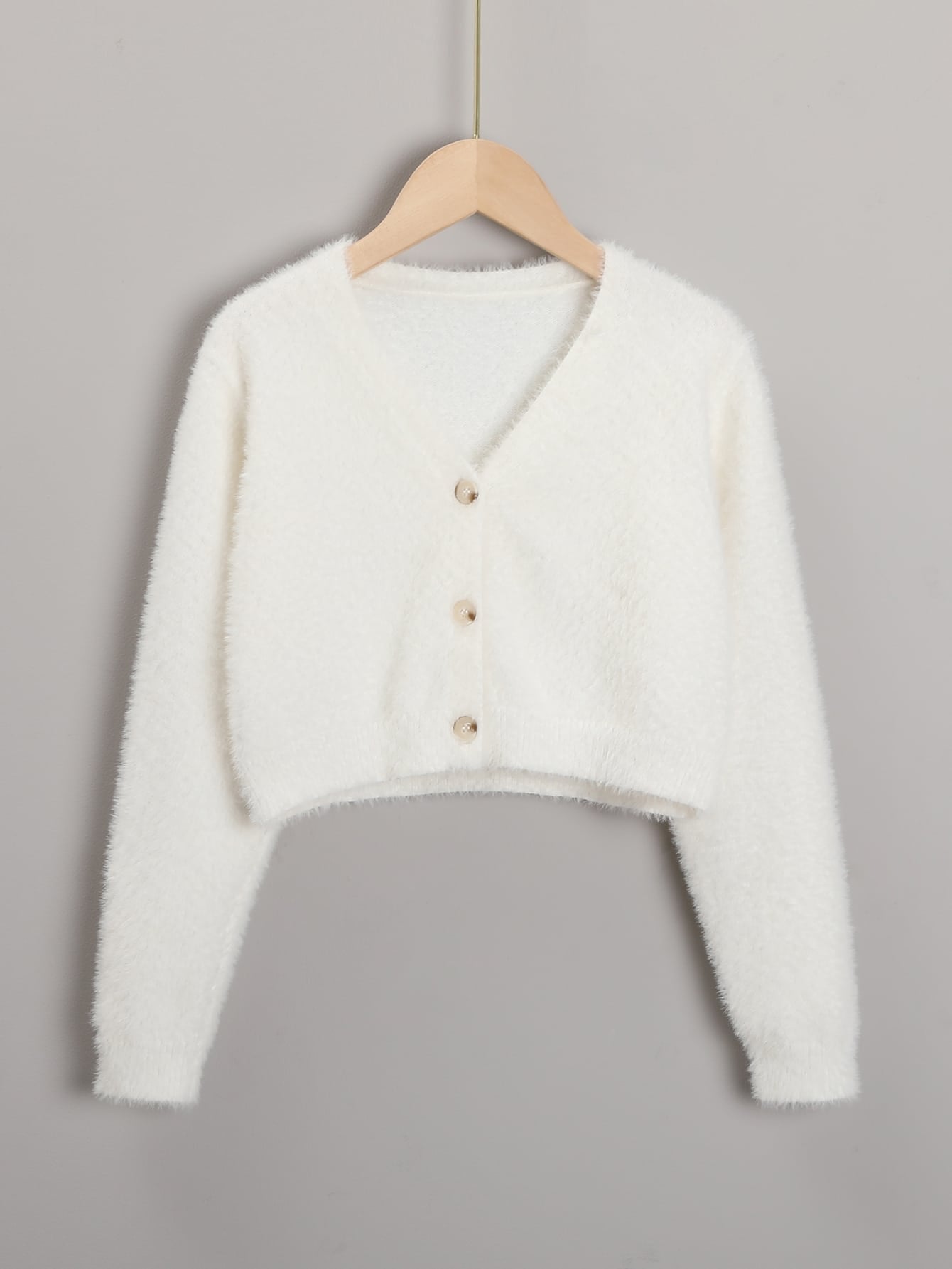 New Fall/Winter Cardigan For Tween Girls. Unique Design With Fluffy Texture Shows The Girl's Unique And Fashionable Taste. The White Color Highlights The Natural And Fresh Features, Which Can Be Paired With Various Clothes, Including T-Shirts, Vests, Cami