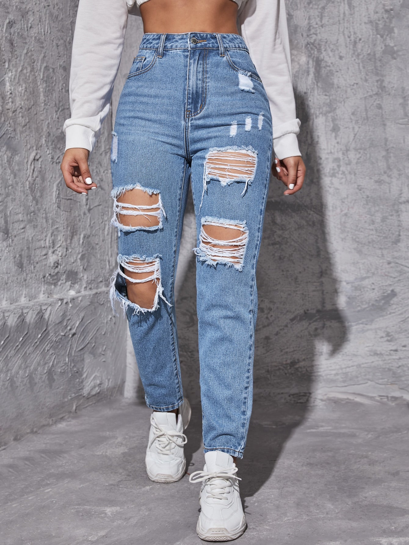 Ripped Frayed Tapered Jeans