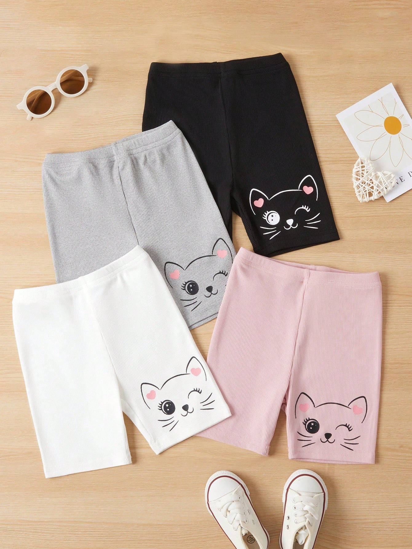 Young Girl 4pcs Cartoon Graphic Ribbed Knit Biker Shorts