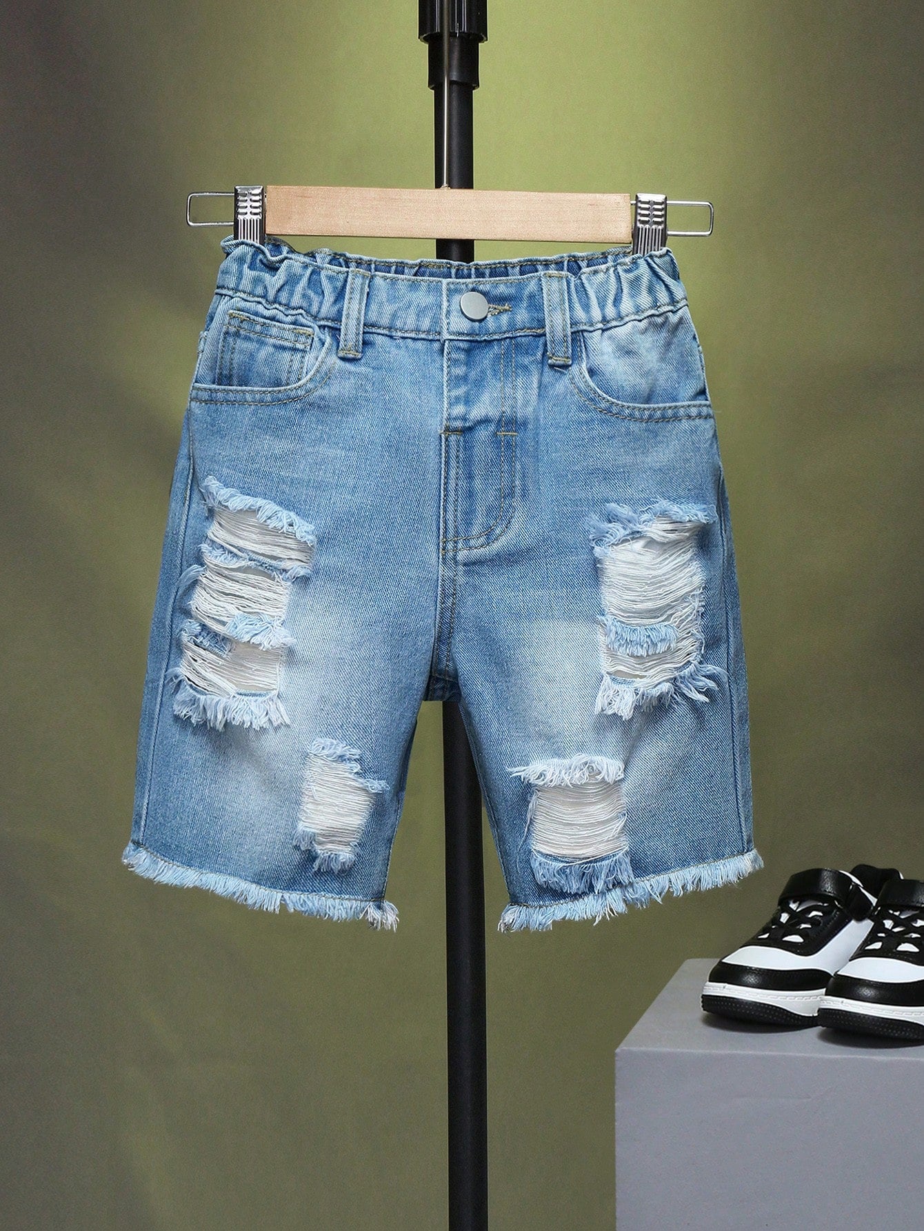 Young Boy Street Style Denim Shorts With Washed, Ripped, Frayed Edge Details And Slanted Pockets