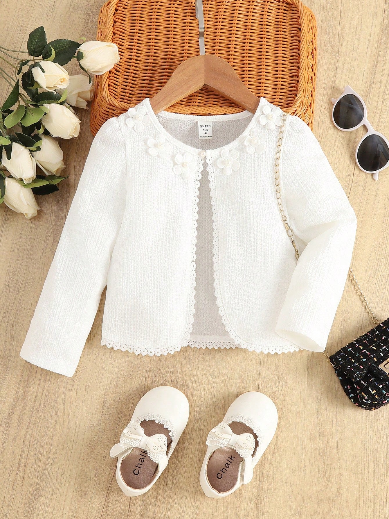 Young Girl Fashionable Elegant Sweet White Little Cardigan, White Striped Texture Elastic Wavy Striped Fabric, 3D Flower Decoration Suitable For Spring, Summer, And Autumn. Match With A White Long-Sleeved Jacket.