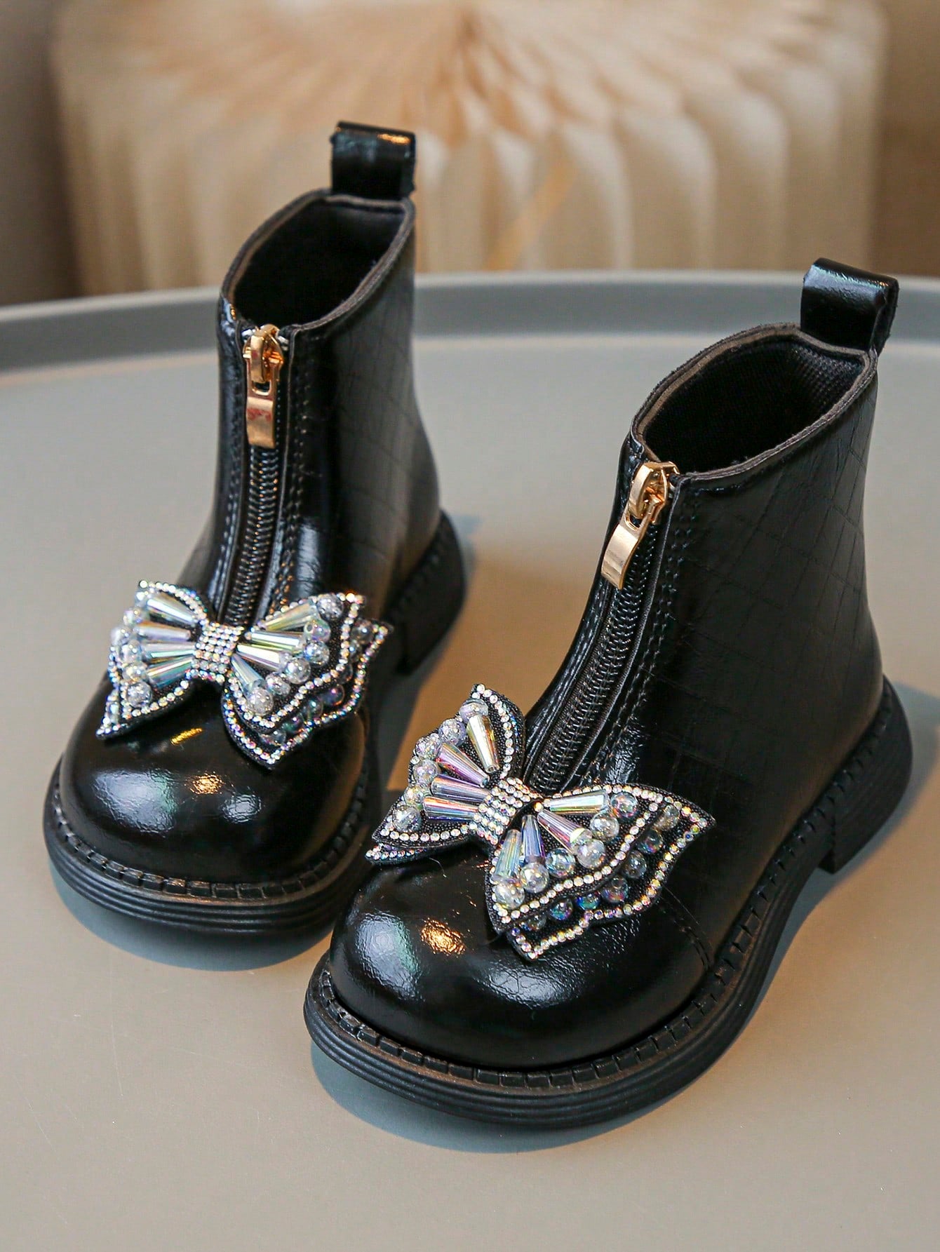 A Pair Of Cute Black Ankle Boots For Little Girls