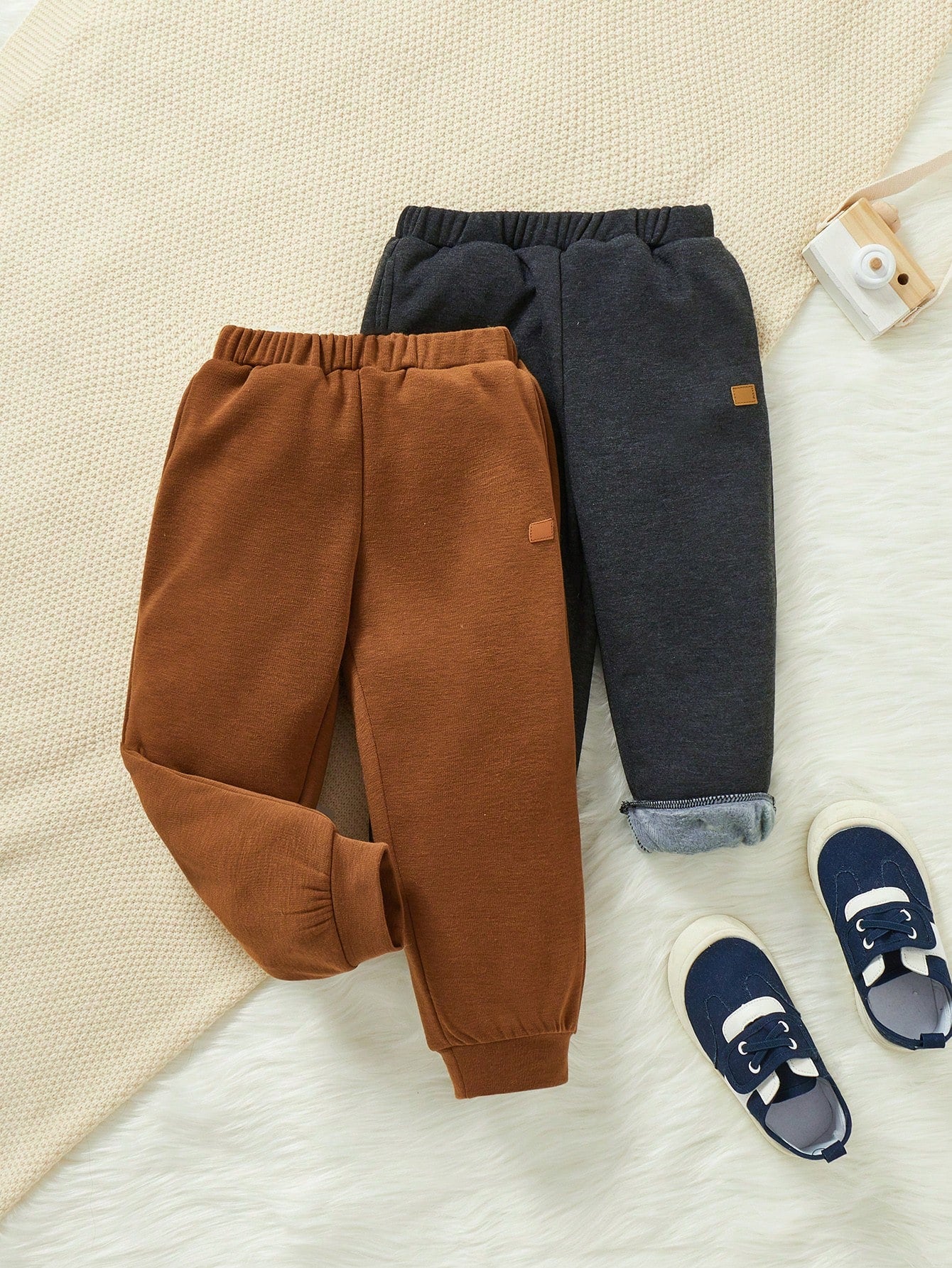 Young Boy Casual Solid Color Jogger Pants With Slanted Pockets And Elastic Cuffs