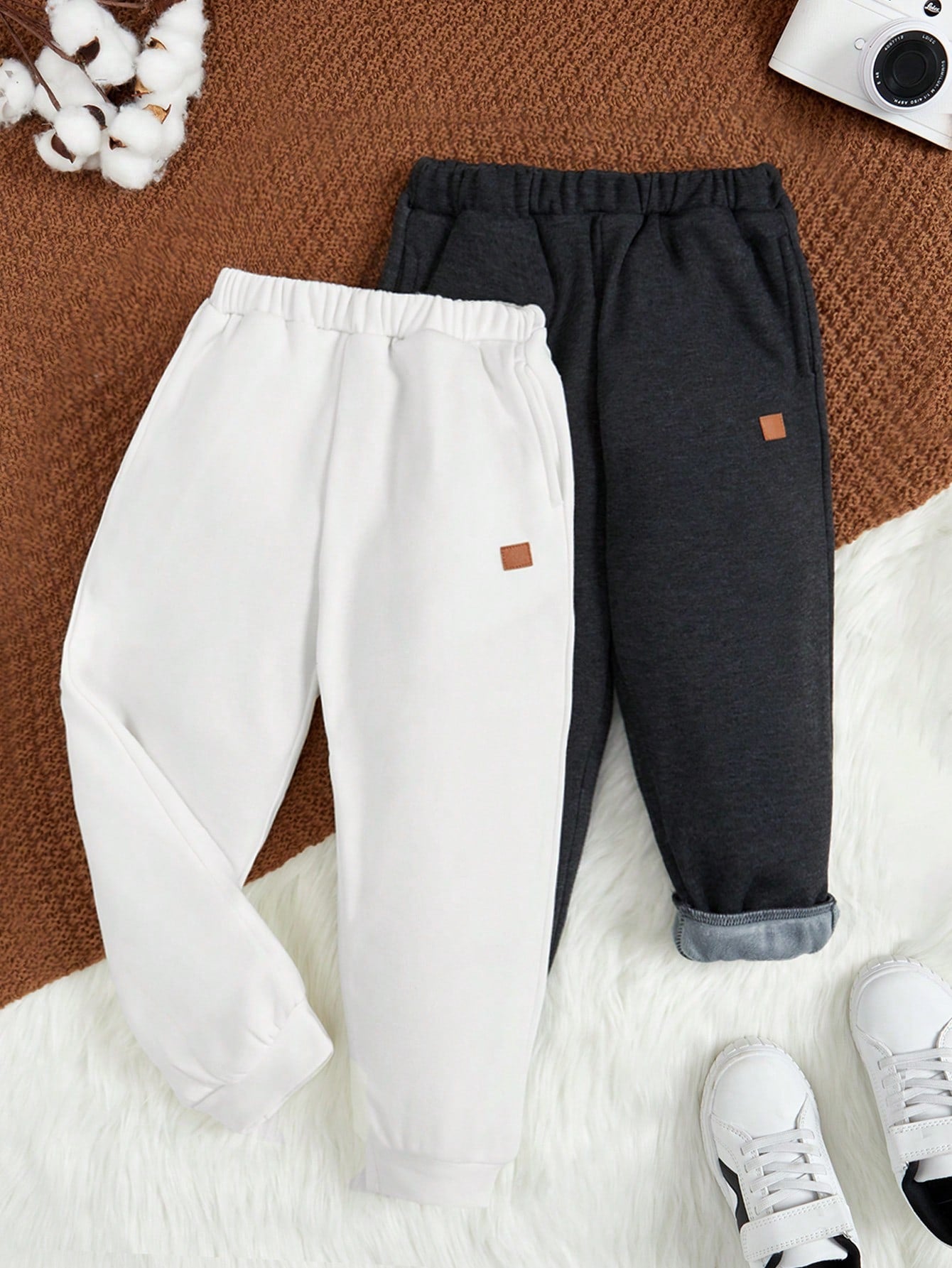 Young Boy Casual Solid Color Jogger Pants With Slanted Pockets And Elastic Cuffs