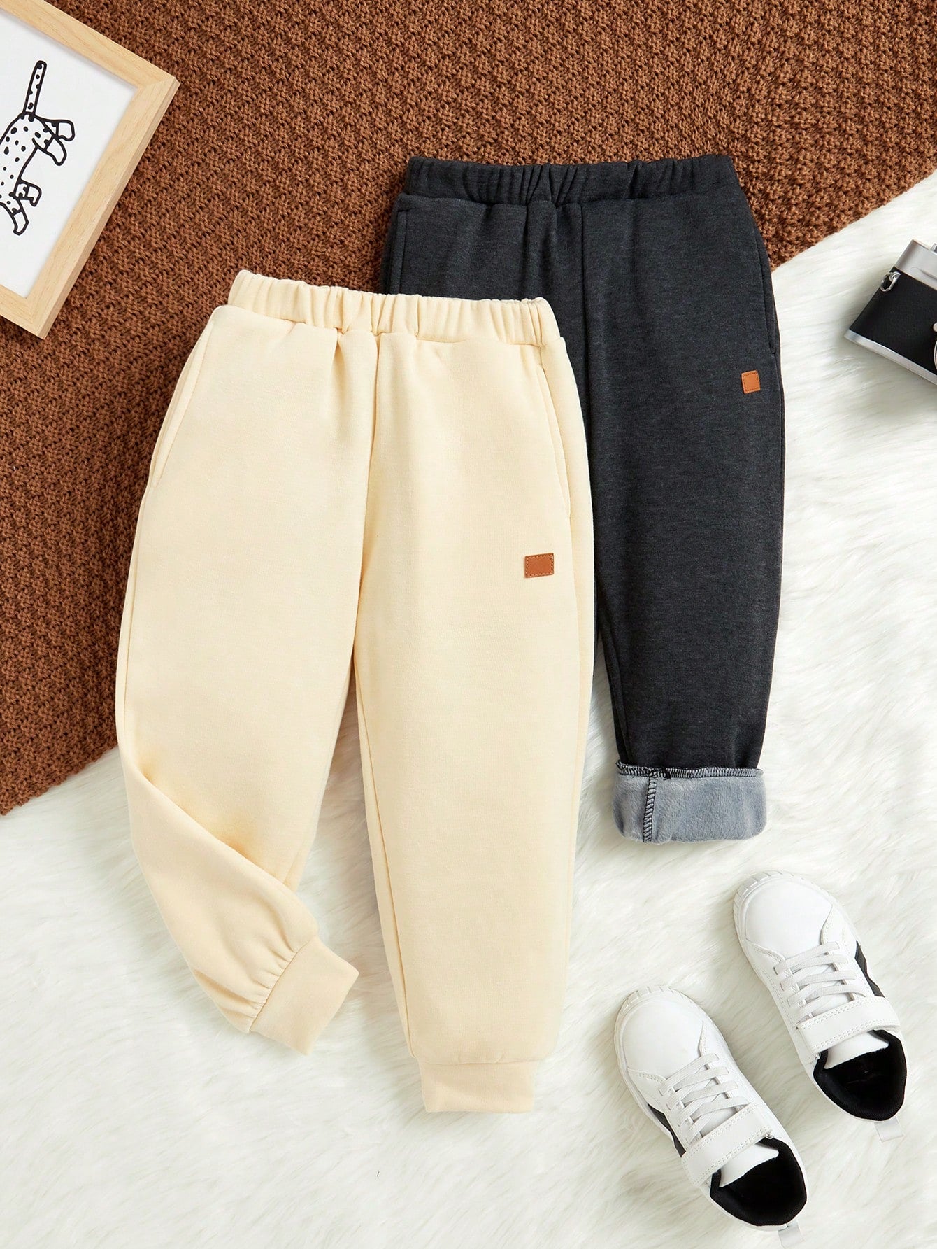 Young Boy Casual Solid Color Jogger Pants With Slanted Pockets And Elastic Cuffs