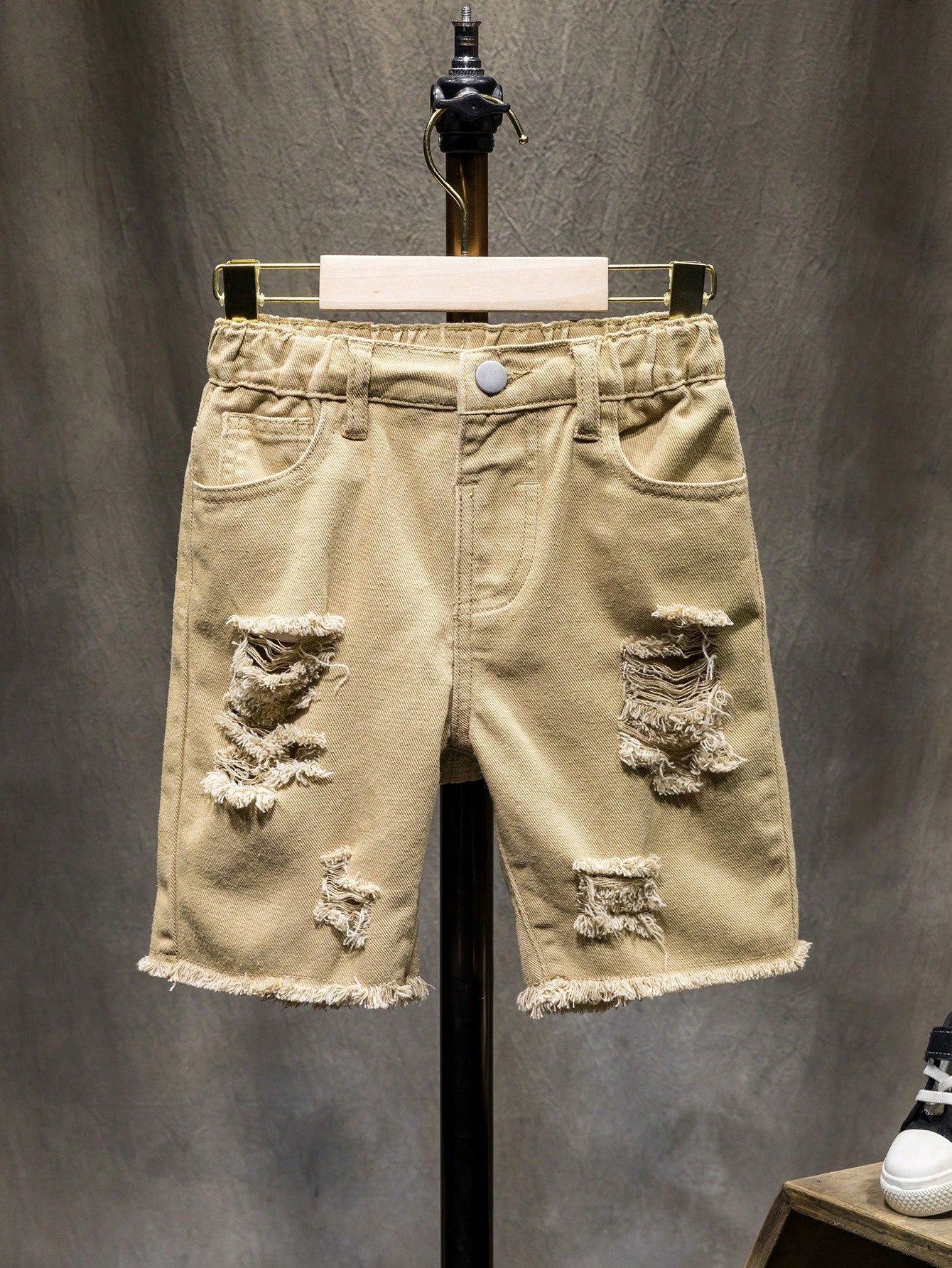 Young Boy Street Style Denim Shorts With Washed, Ripped, Frayed Edge Details And Slanted Pockets