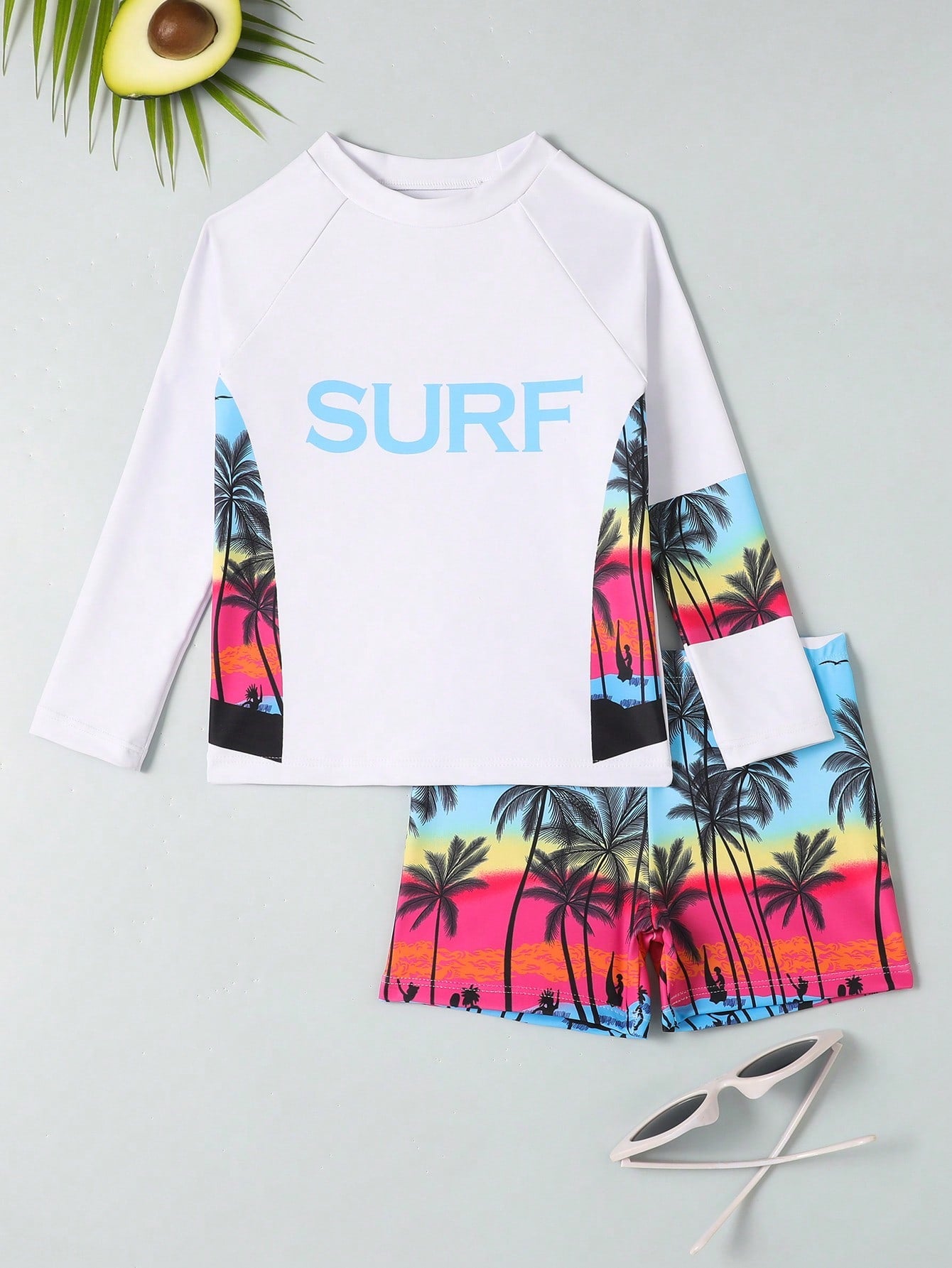 Young Boy Surfing Theme Print Raglan Sleeve Top And Random Print Swim Shorts Set