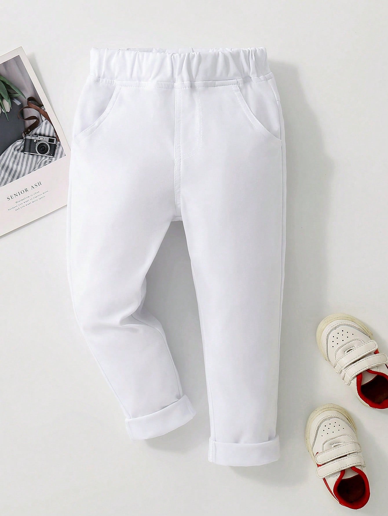 Young Boy Simple Elastic Waist Slant Pocket Tapered Trousers