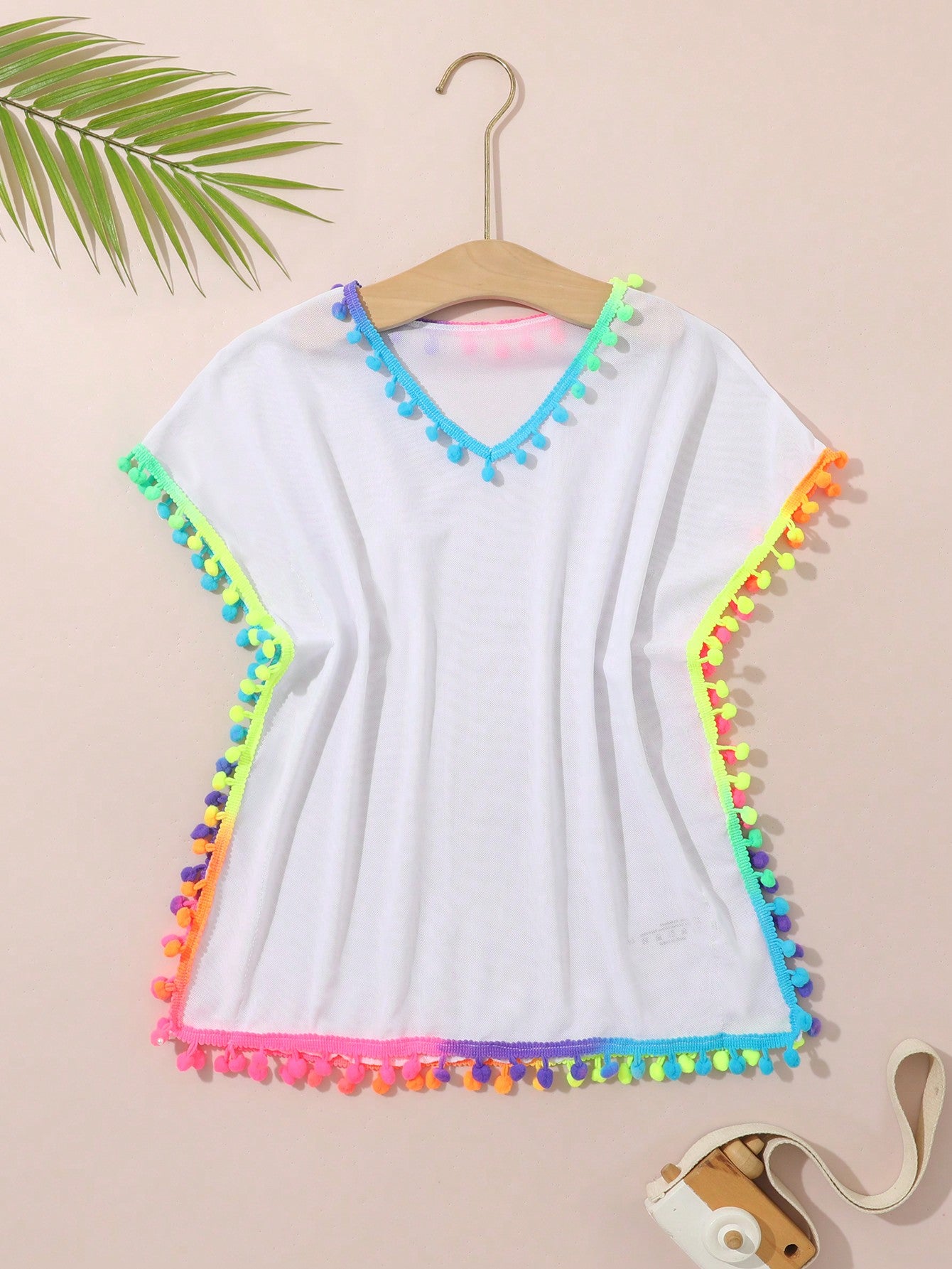 Young Girl Cover Up With Colorful Ball Embellishment