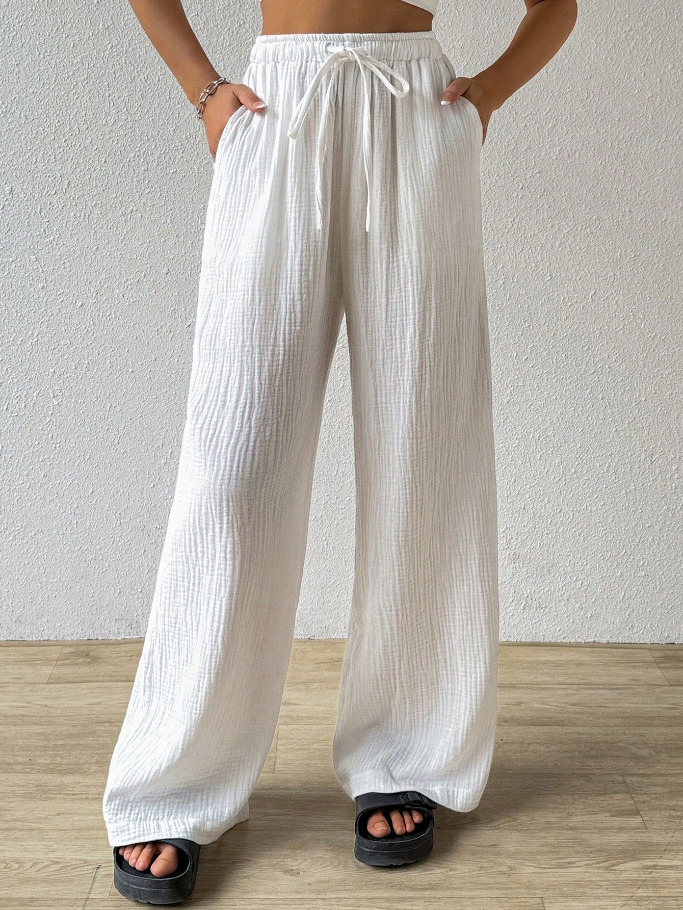 Loose Wide-Leg Pants With Textured Wrinkled Fabric And Drawstring Waist