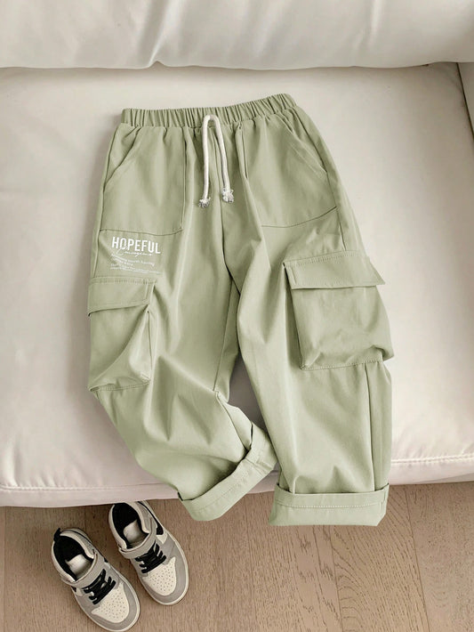 Young Boy Casual Sports Trendy Streetwear White Loose Pants With 3d Pockets And Cute English Print, Suitable For Daily Wear, School, Sports, Travel, Outdoors In Spring And Summer