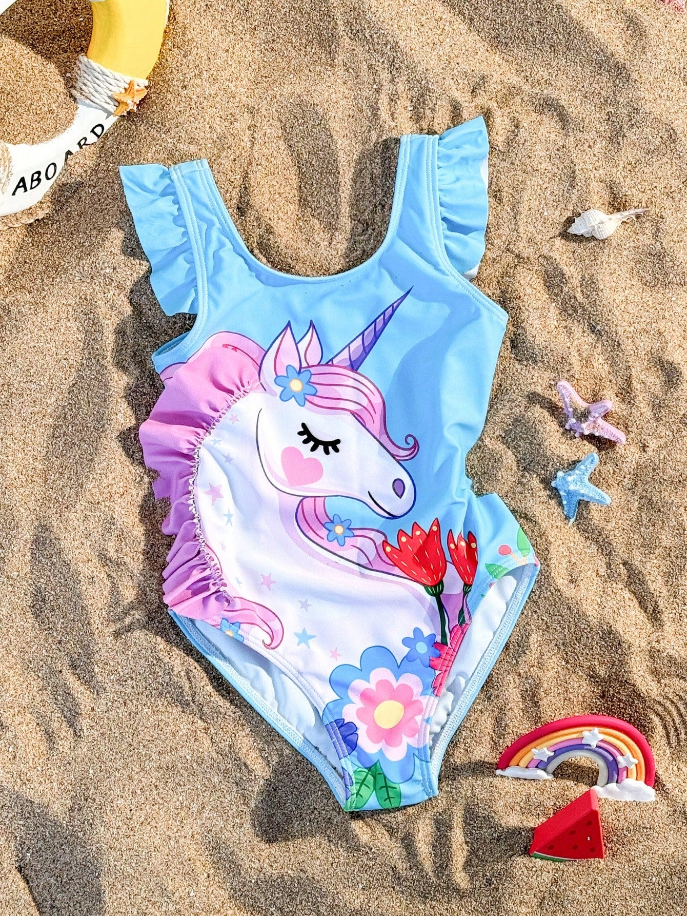 Young Girl One Piece Unicorn Printed Swimsuit With Ruffled Edge Design