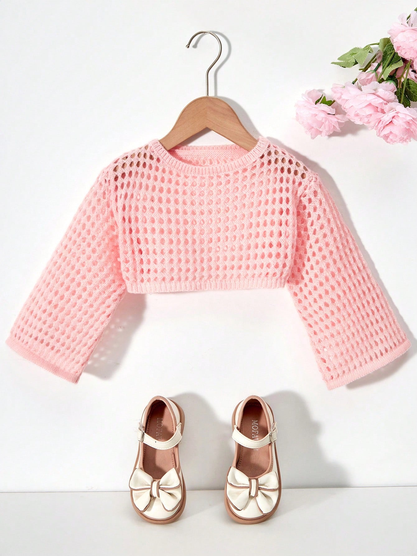 Young Girl Knitted Short Sweater With Hollow Out Design