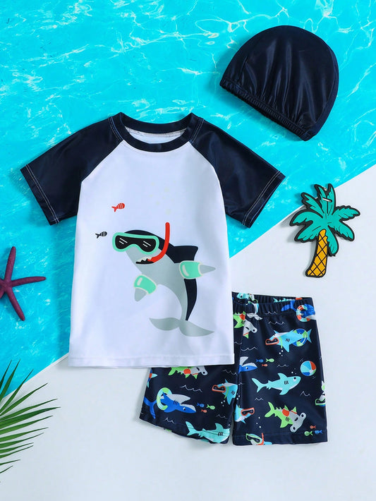 Young Boy Shark Print Colorblock Swimwear Set With Short Sleeve Shirt, Shorts And Cap (3pcs)