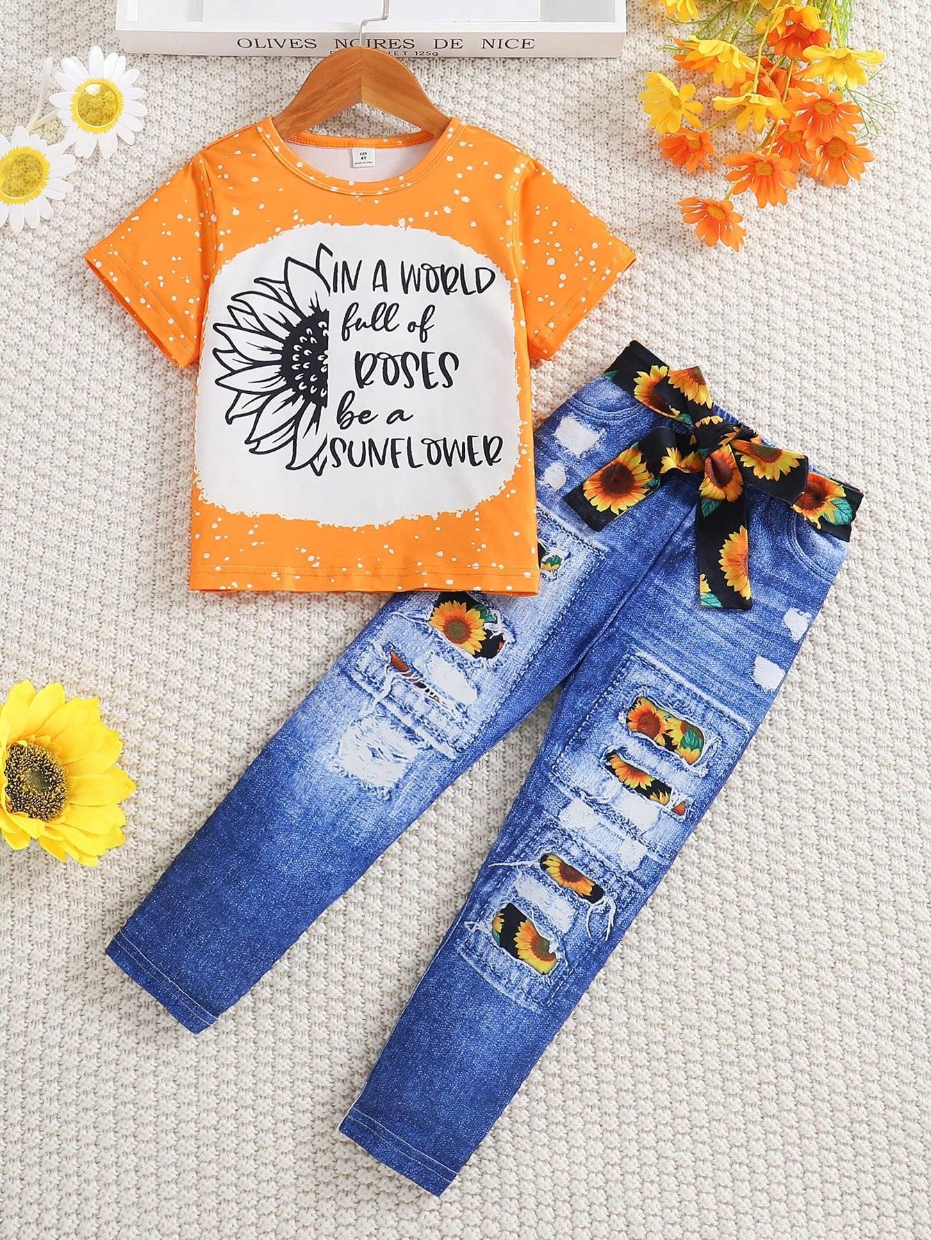 Young Girl Summer 2pcs Fashionable Sunflower & Letter Print Knitted Short Sleeve Top And Distressed Jeans With Sunflower Belt Casual Outfit