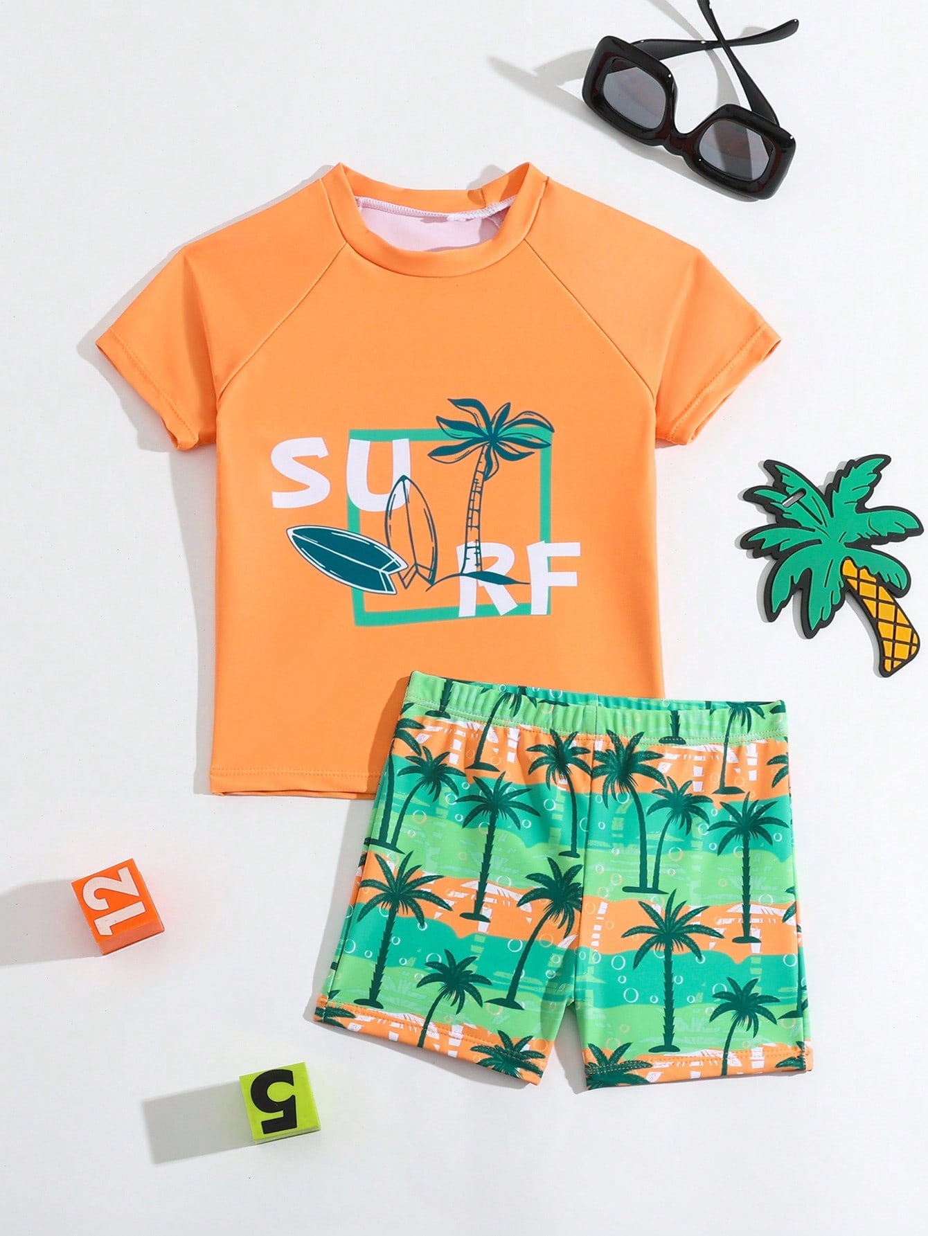 Young Boy's Coconut Pattern Printed Raglan Short Sleeve Top And Shorts Swimsuit Set