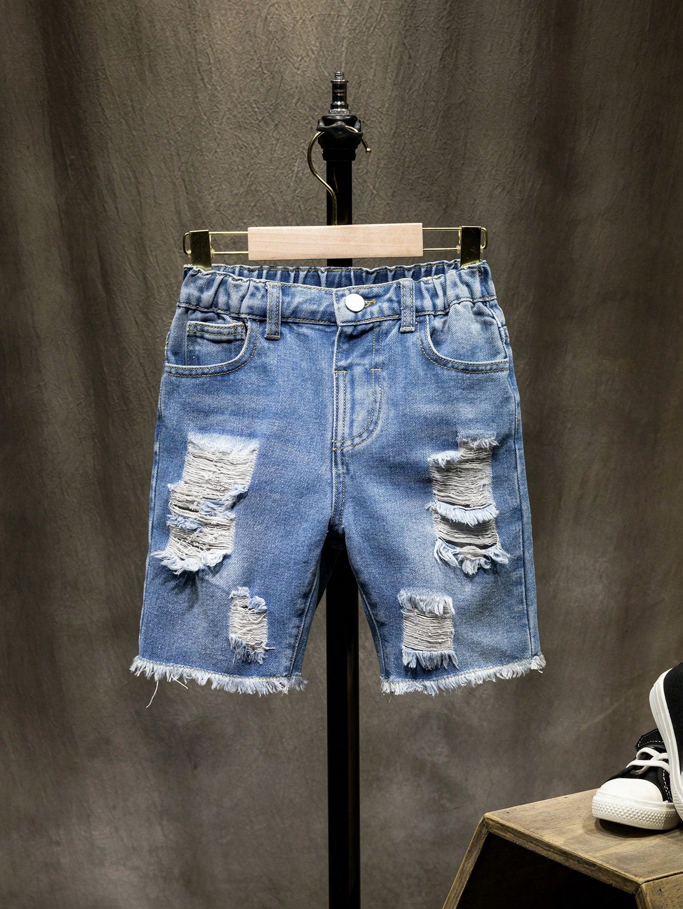 Young Boy Street Style Denim Shorts With Washed, Ripped, Frayed Edge Details And Slanted Pockets