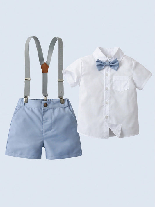 Young Boy Gentleman Suit Two-Piece Set, Short-Sleeved White Shirt With Bow Tie And Blue Suspenders Shorts, Stylish And Handsome, Suitable For Birthday Parties, Weddings, Performances And Banquets