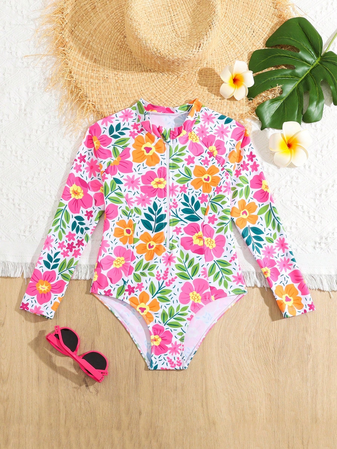 Young Girl Holiday Style One-Piece Swimsuit With Floral Print Long-Sleeved Design