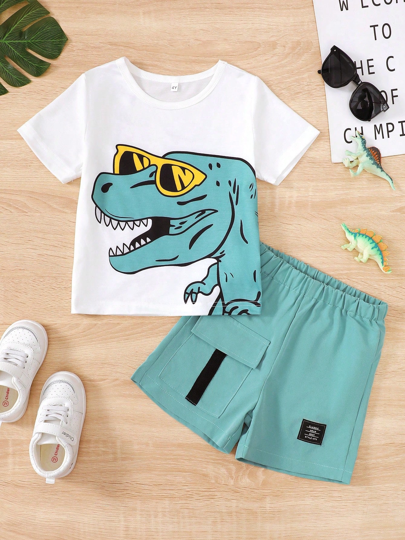 Young Boy Dinosaur Digital Print Round Neck Short Sleeved T-Shirt And Flip Pocket Work Shorts Summer Casual Sports Set