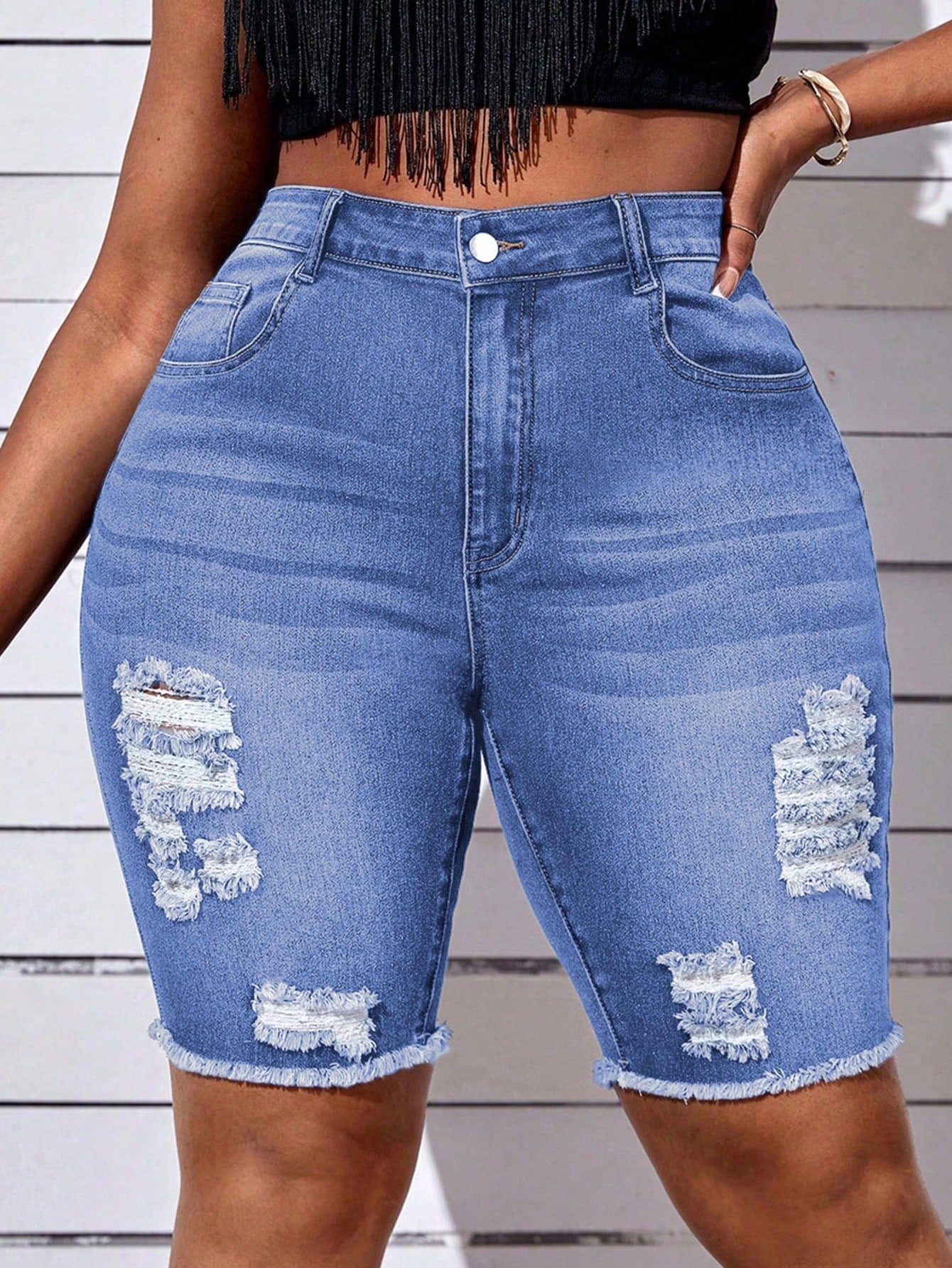 Plus High Waist Ripped Raw Hem Denim Shorts