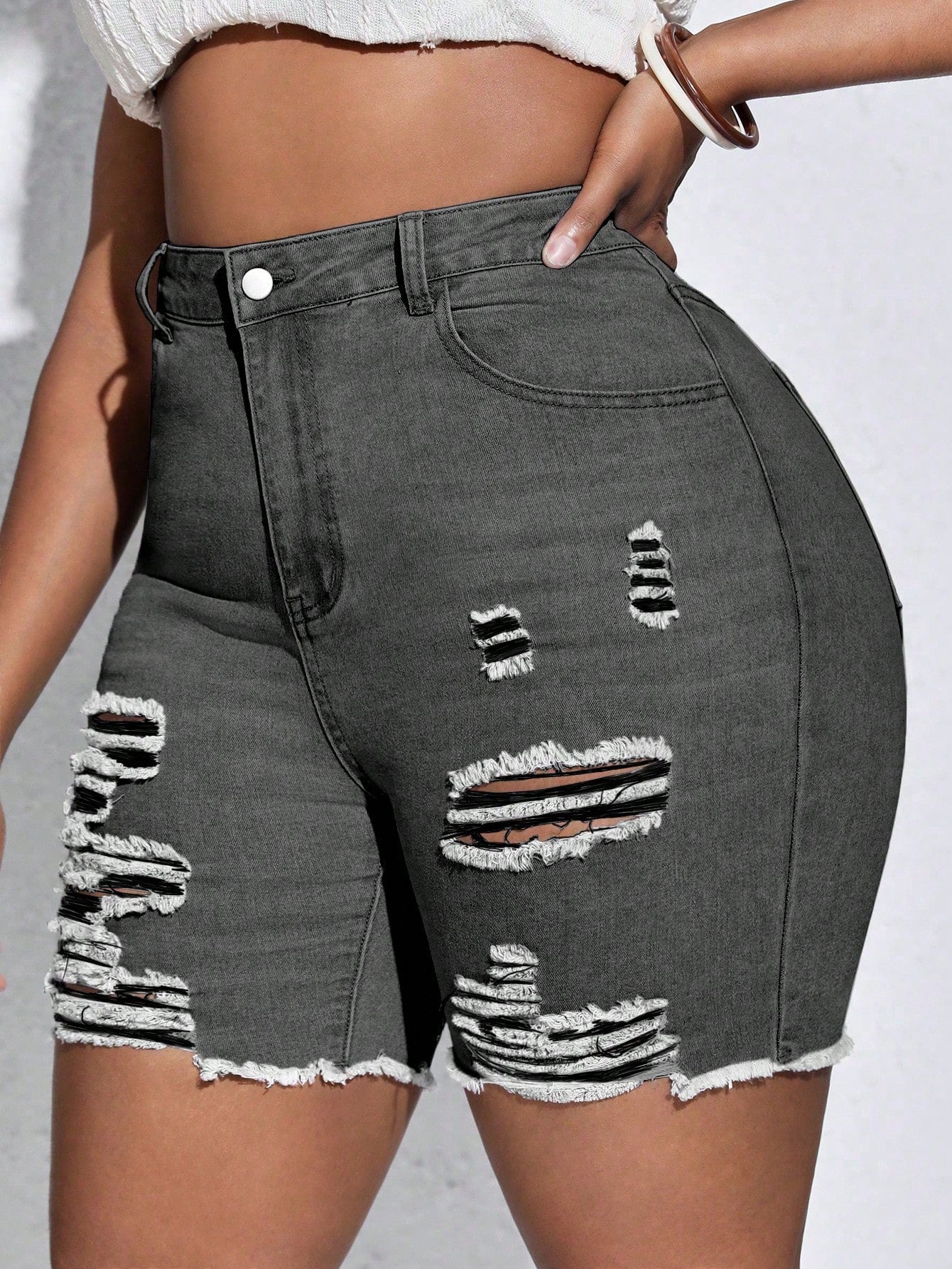 Plus High Waist Ripped Raw Hem Denim Shorts