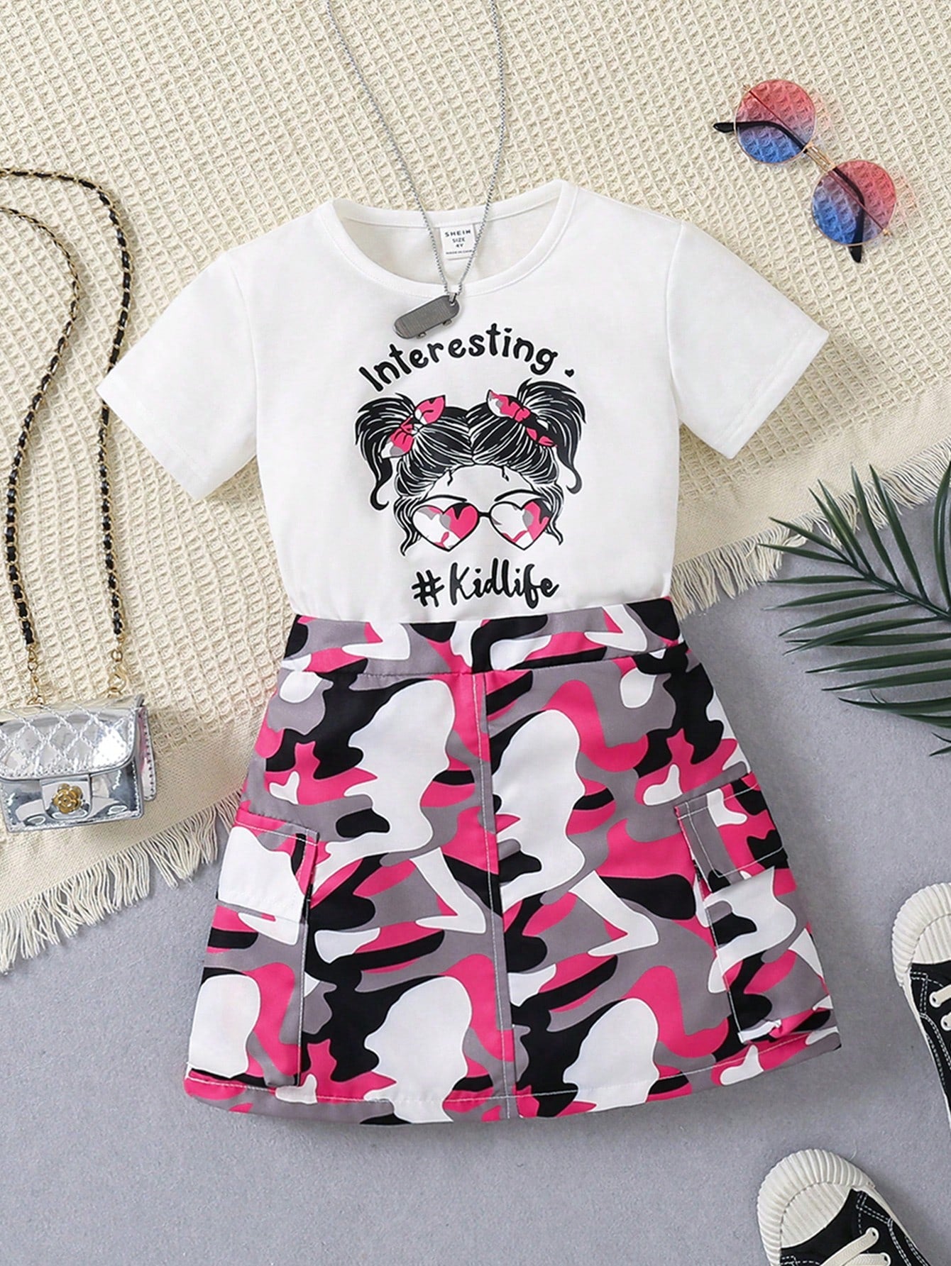 Young Girl Letter & Character Printed Short Sleeve T-Shirt And Camo Cargo Skirt Set