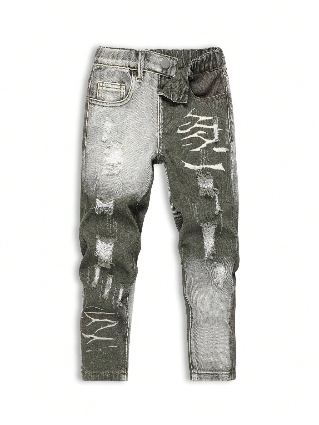 Young Boy Vintage Jeans With Distressing And Shredding In Street Style