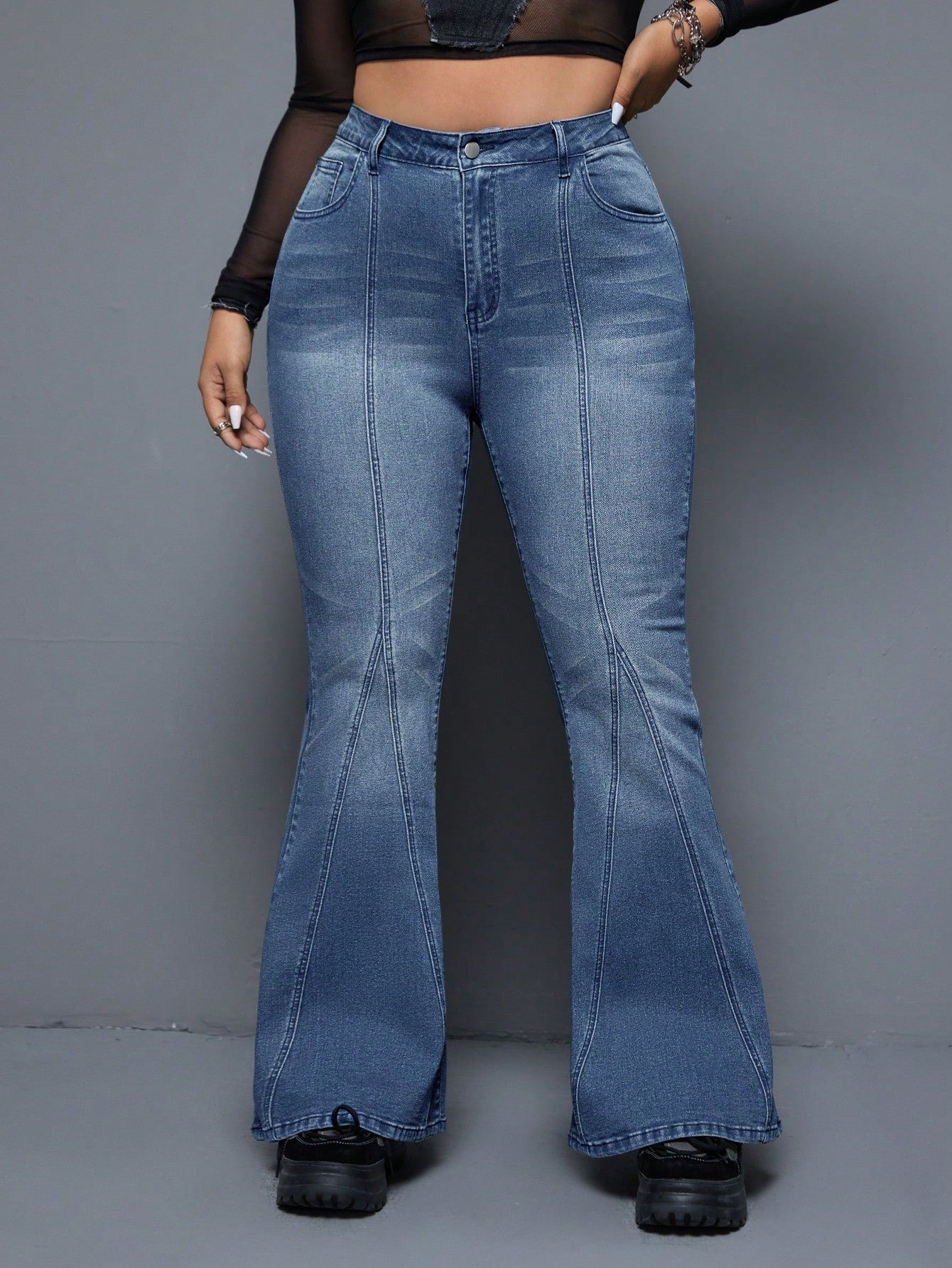 Plus Size Washed Denim Flared Jeans With Slanted Pockets