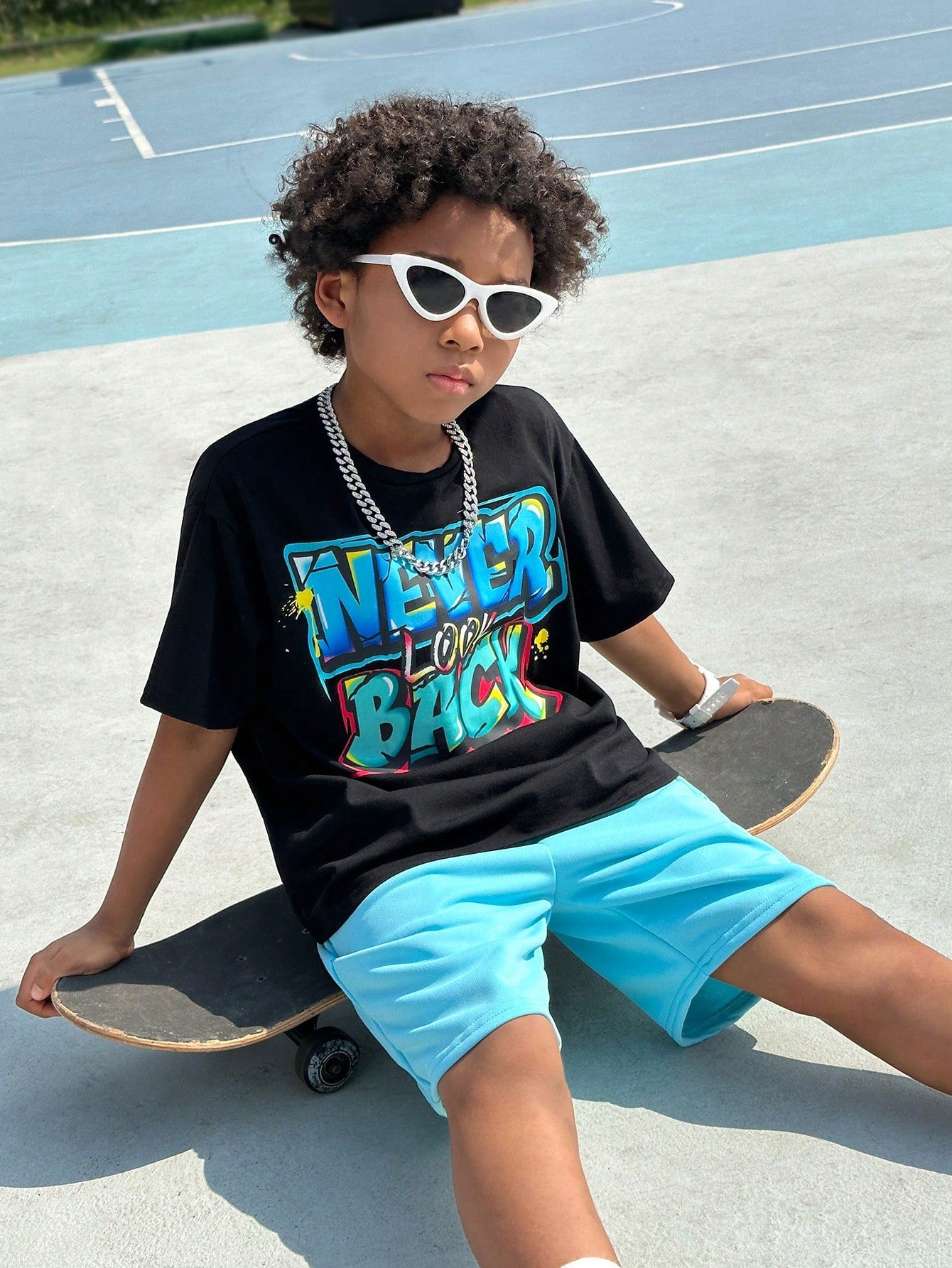 Tween Boys' Casual Street Graffiti Letter Print Round Neck Loose Fit T-Shirt With Solid Color Knitted Shorts Set