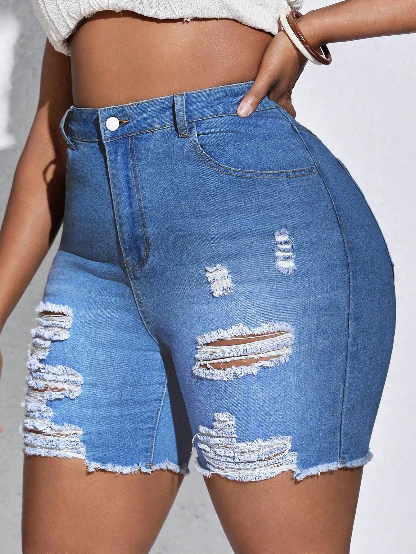 Plus High Waist Ripped Raw Hem Denim Shorts