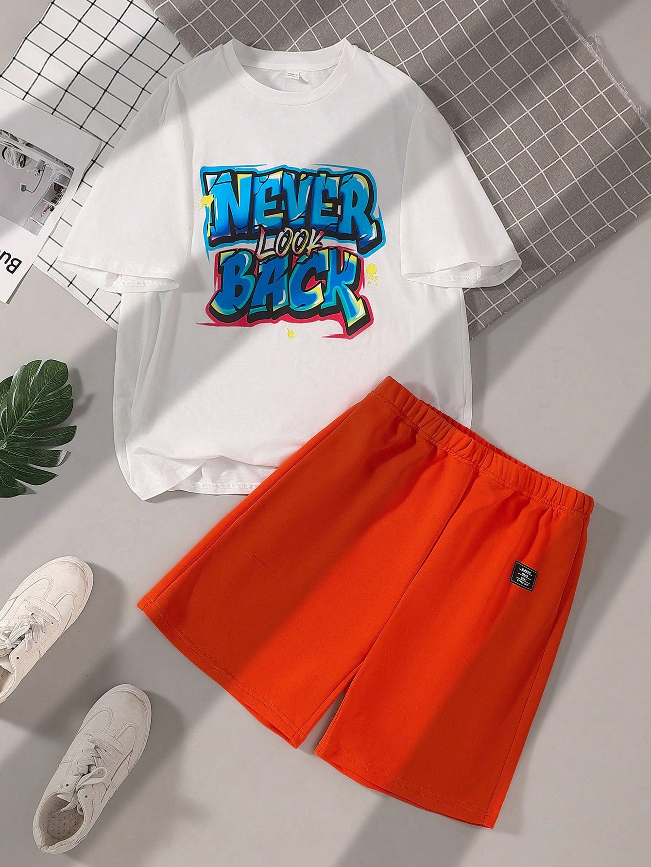 Teen Boy Casual Graffiti & Letter Print Round Neck Pullover Short Sleeve T-Shirt And Knitted Letter Pattern Shorts Set