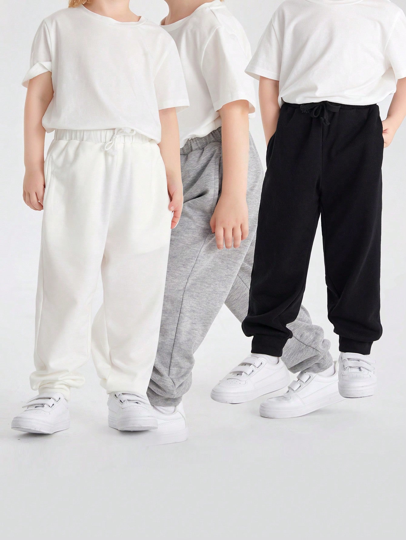 Young Boy Casual College Style Solid Color Knitted Jogger Pants, Loose Fit, Bundle Of 3, One In Each Of 3 Colors