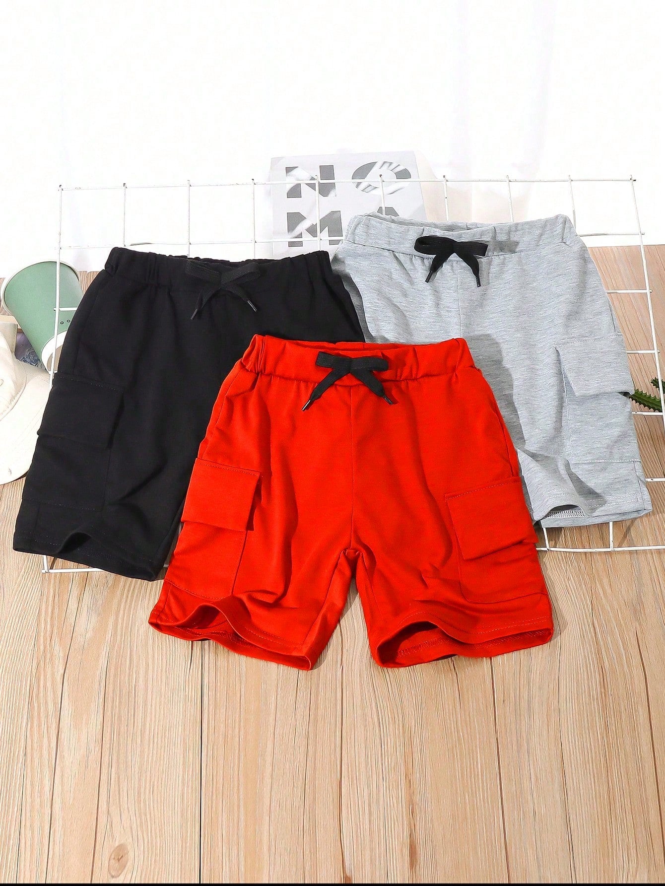 Young Boy Leisure Sports College Street Fashionable Cute Holiday 3-Pieces Set With Large Pockets, Drawstring, Includes Green Shorts, Brown Shorts, And Black Shorts Suitable For Daily Wear, School, Travel, Sports, Spring And Summer Seasons