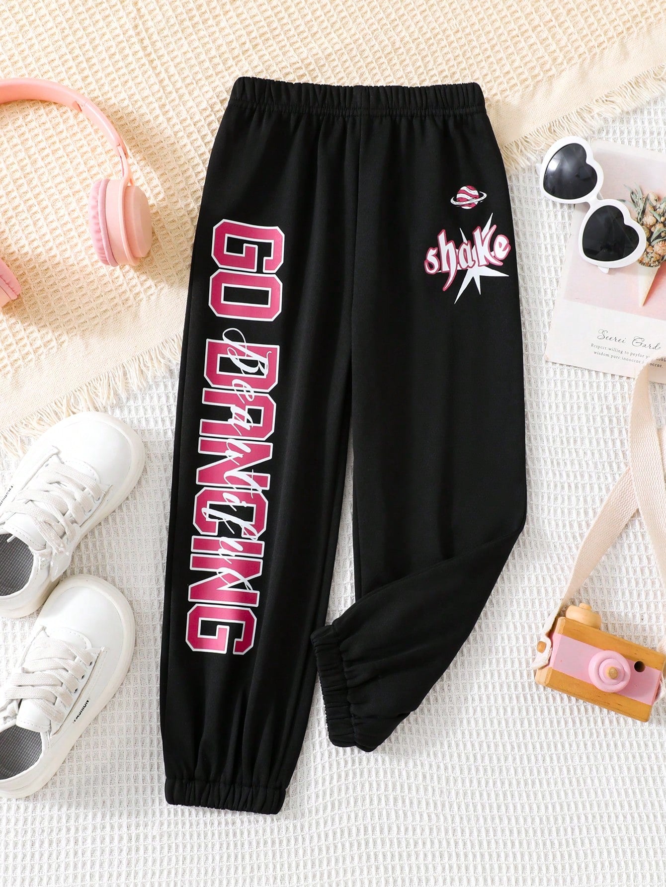 Young Girls' Black Printed Color Block Letter Joggers With Loose Fit And Stylish Details, Suitable For Trendy Kids