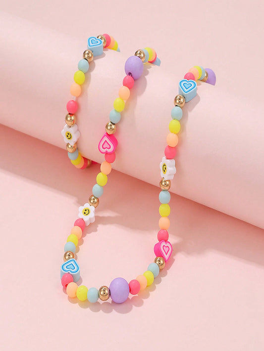 2pcs/Set Girls'Smiling Face And Heart-Shaped Soft Ceramic Pendant, Macaron-Colored Elastic Beaded Necklace And Bracelet