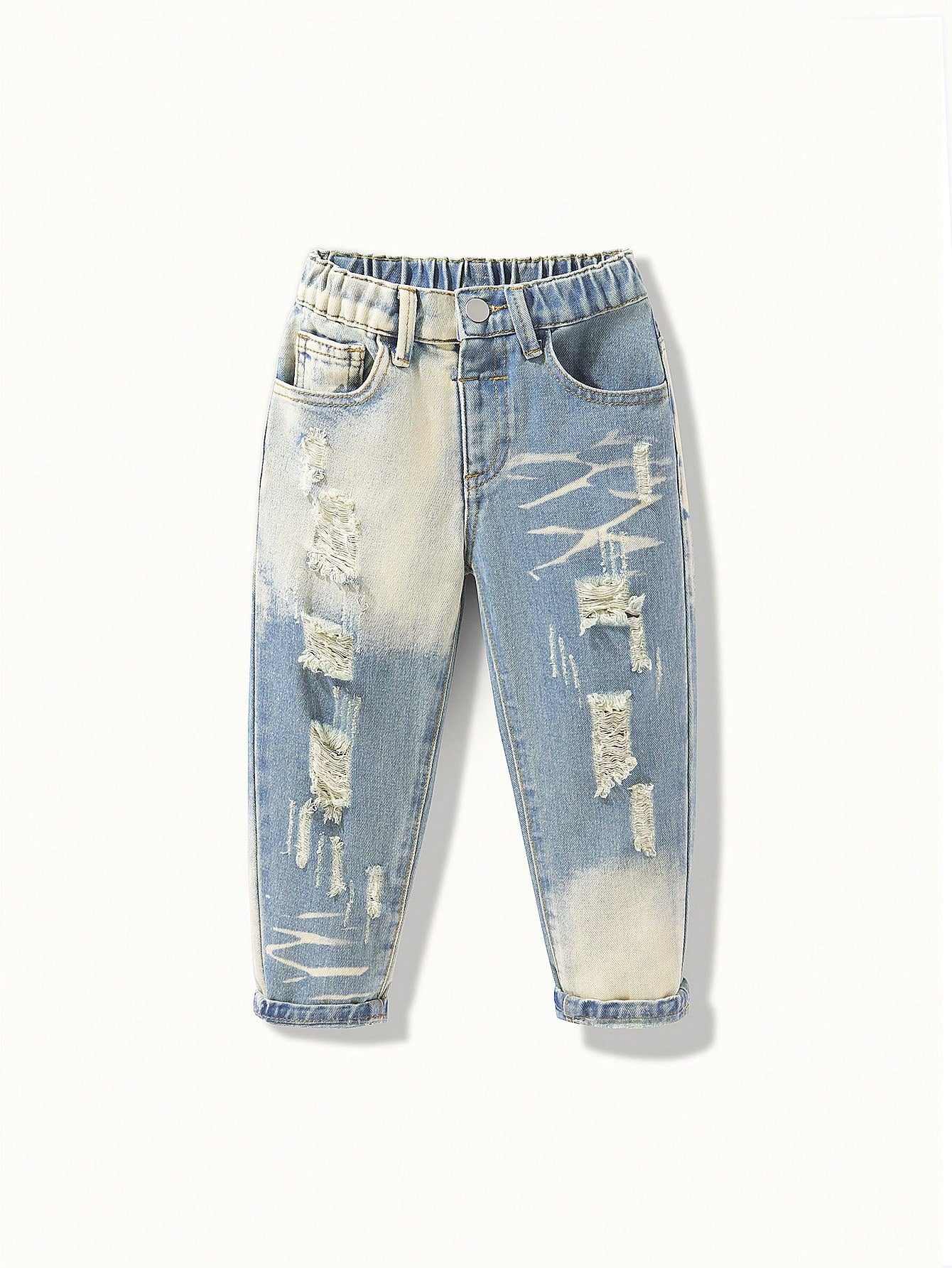 Young Boy Vintage Jeans With Distressing And Shredding In Street Style