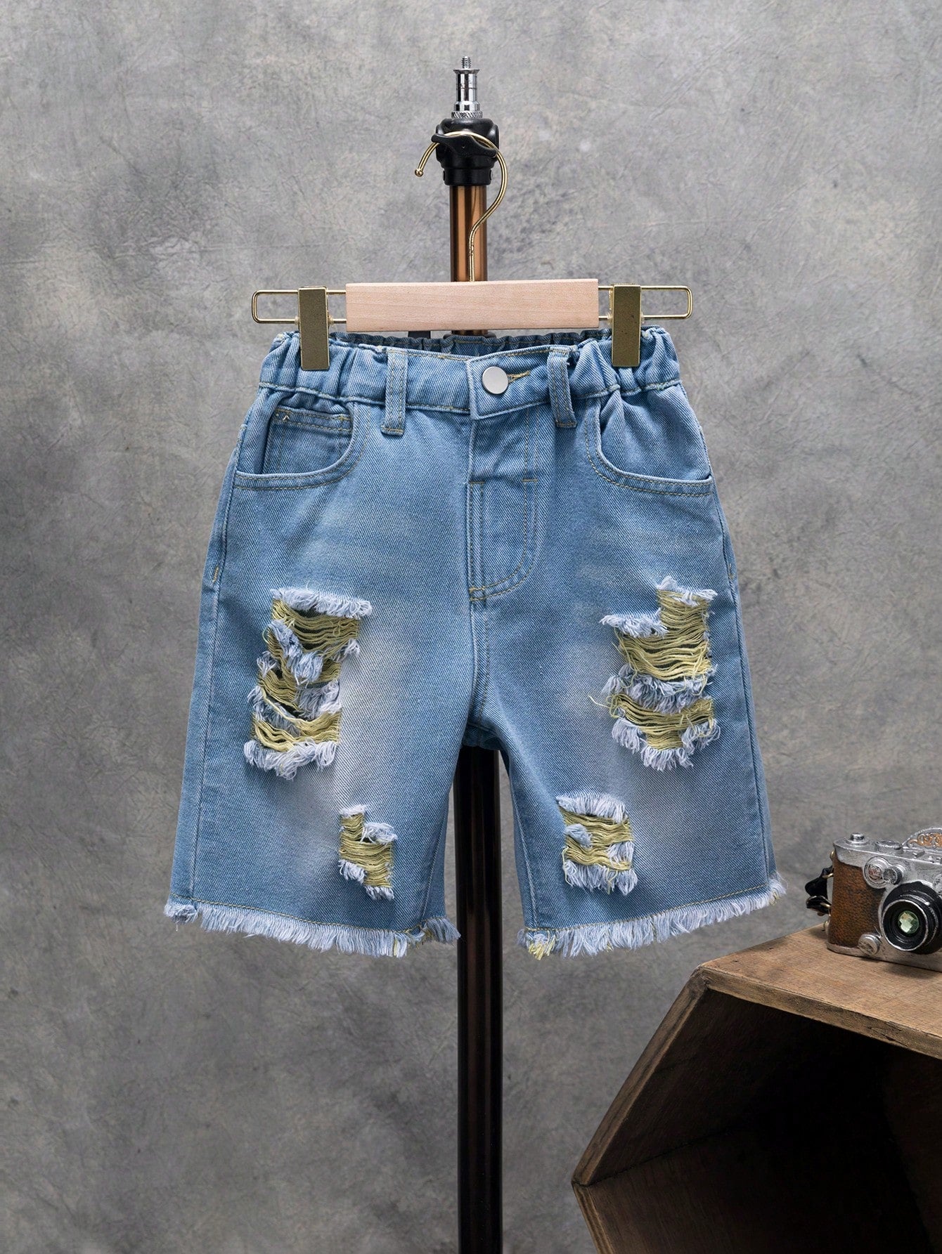 Young Boy Street Style Denim Shorts With Washed, Ripped, Frayed Edge Details And Slanted Pockets