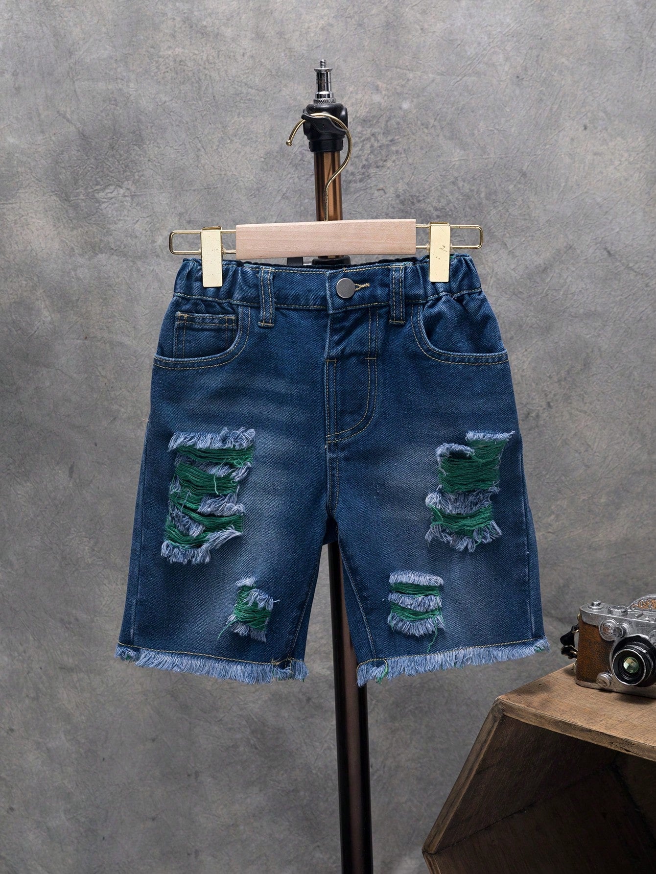 Young Boy Street Style Denim Shorts With Washed, Ripped, Frayed Edge Details And Slanted Pockets