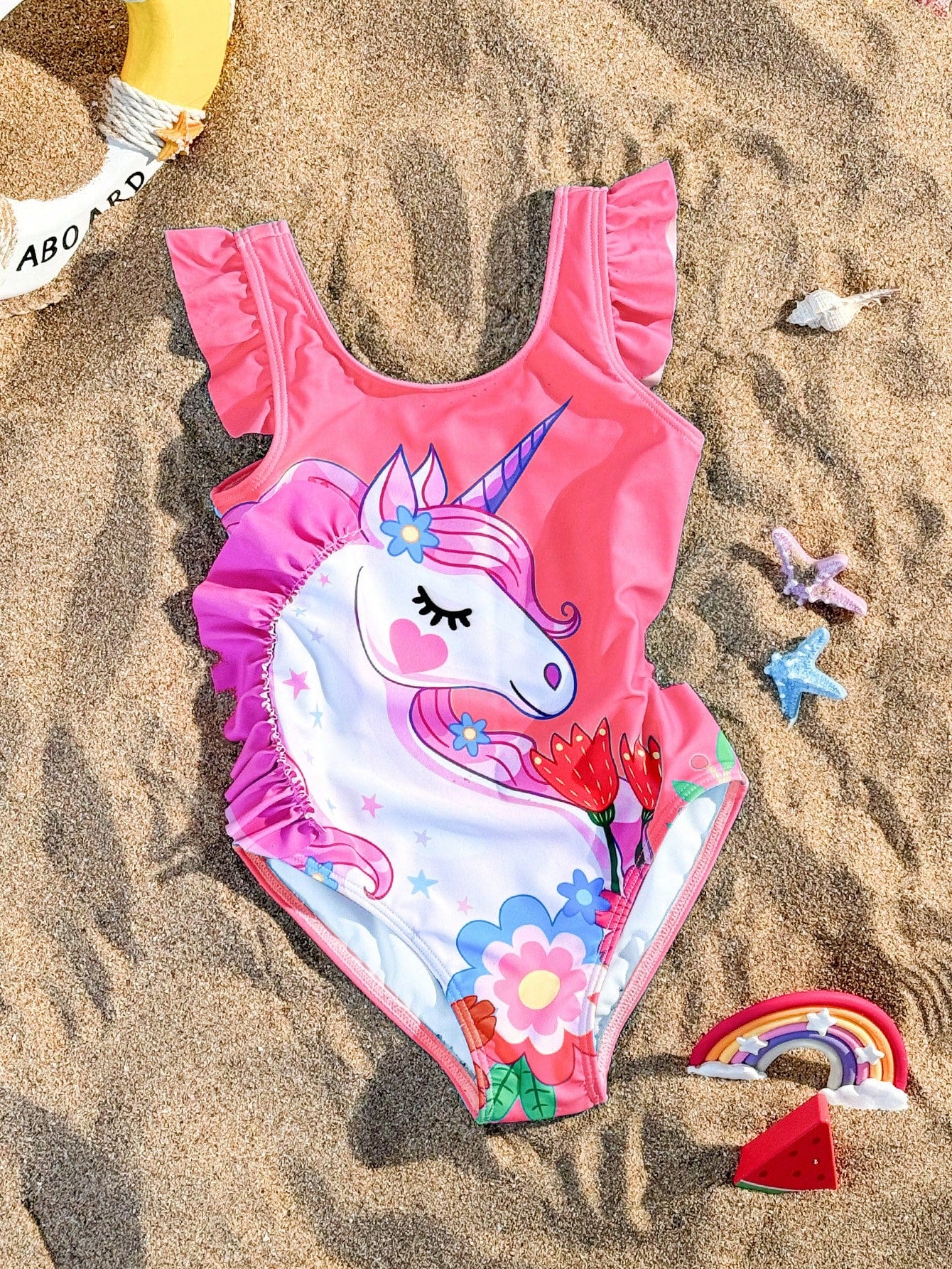 Young Girl One Piece Unicorn Printed Swimsuit With Ruffled Edge Design