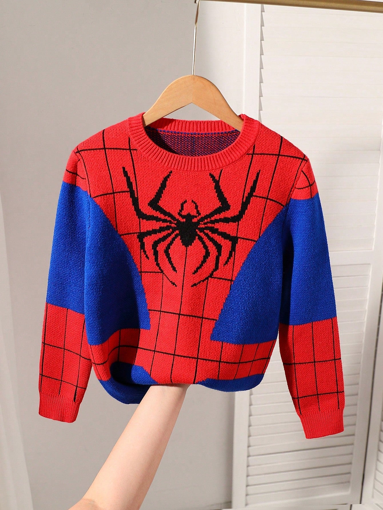 This Spider Red And Blue Sweater Stands Out With Its Unique Design Featuring A Spider Pattern That Exudes A Mysterious Vibe. The Red And Blue Color Combination Is Lively And Charming, Adding To Its Personality And Appeal. The Soft Sweater Fabric Is Warm A