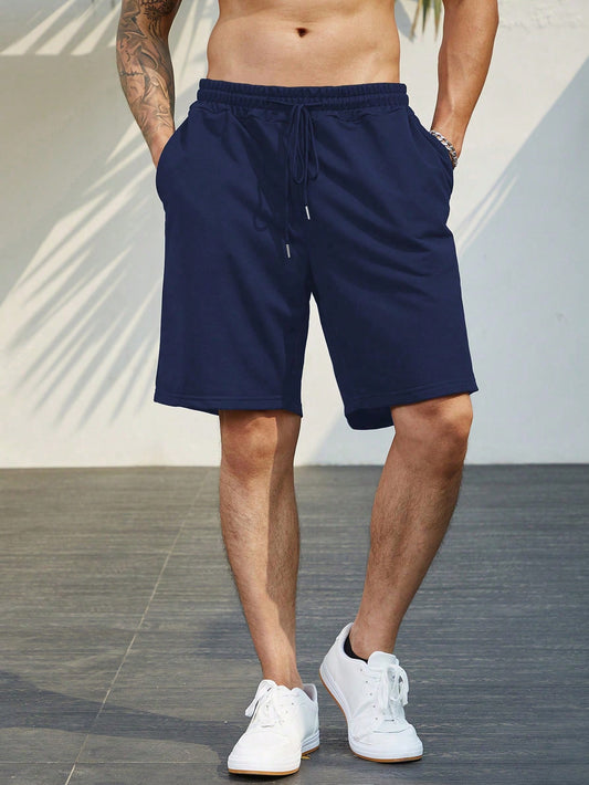 Men Plus Solid Drawstring Waist Slant Pocket Shorts