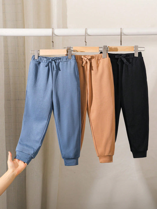 Young Boy Casual College Style Solid Color Knitted Jogger Pants, Loose Fit, Bundle Of 3, One In Each Of 3 Colors