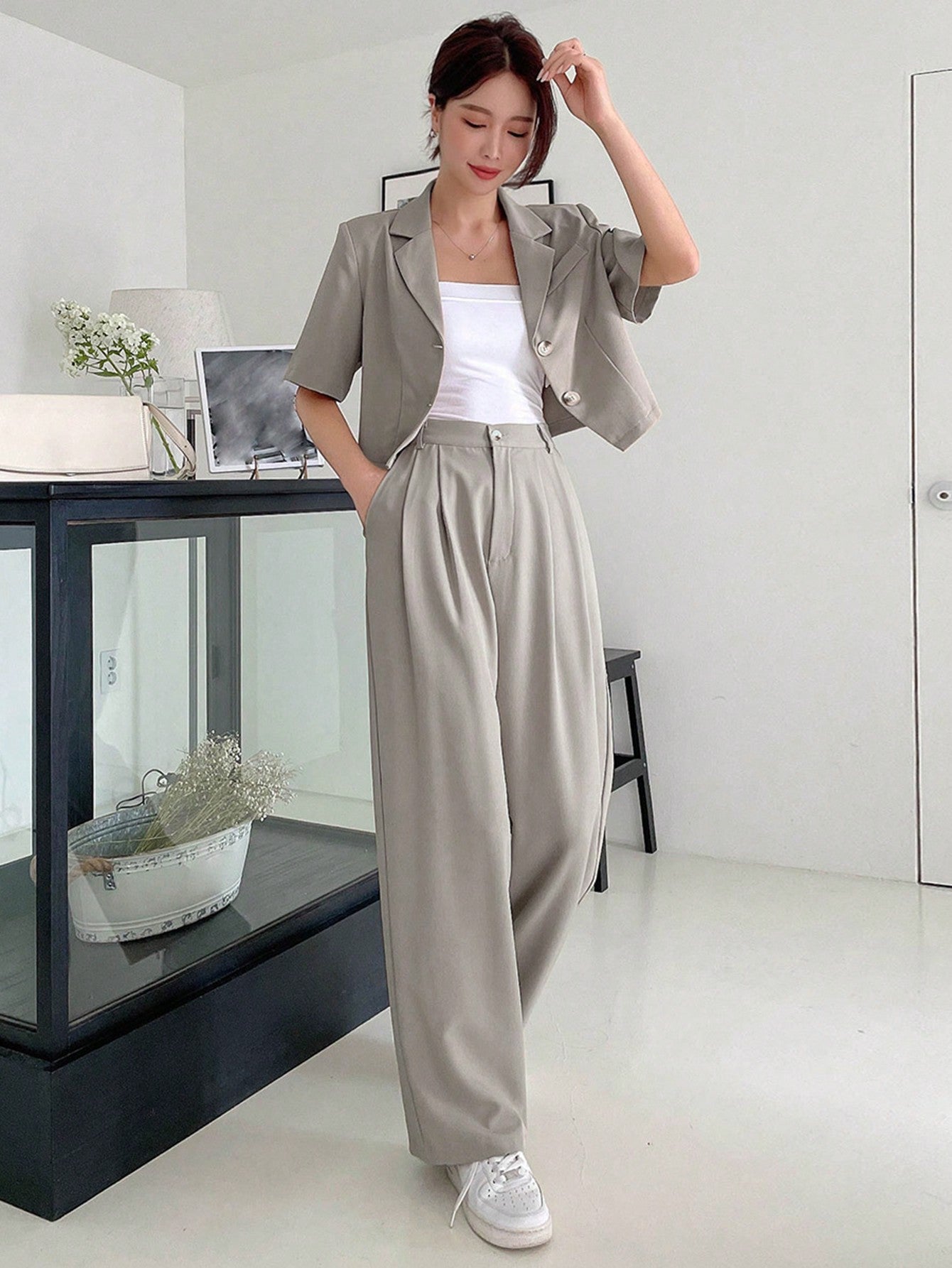 Ladies Solid Color Single Breasted Short Sleeve Blazer And Pocketed Long Pants Suit