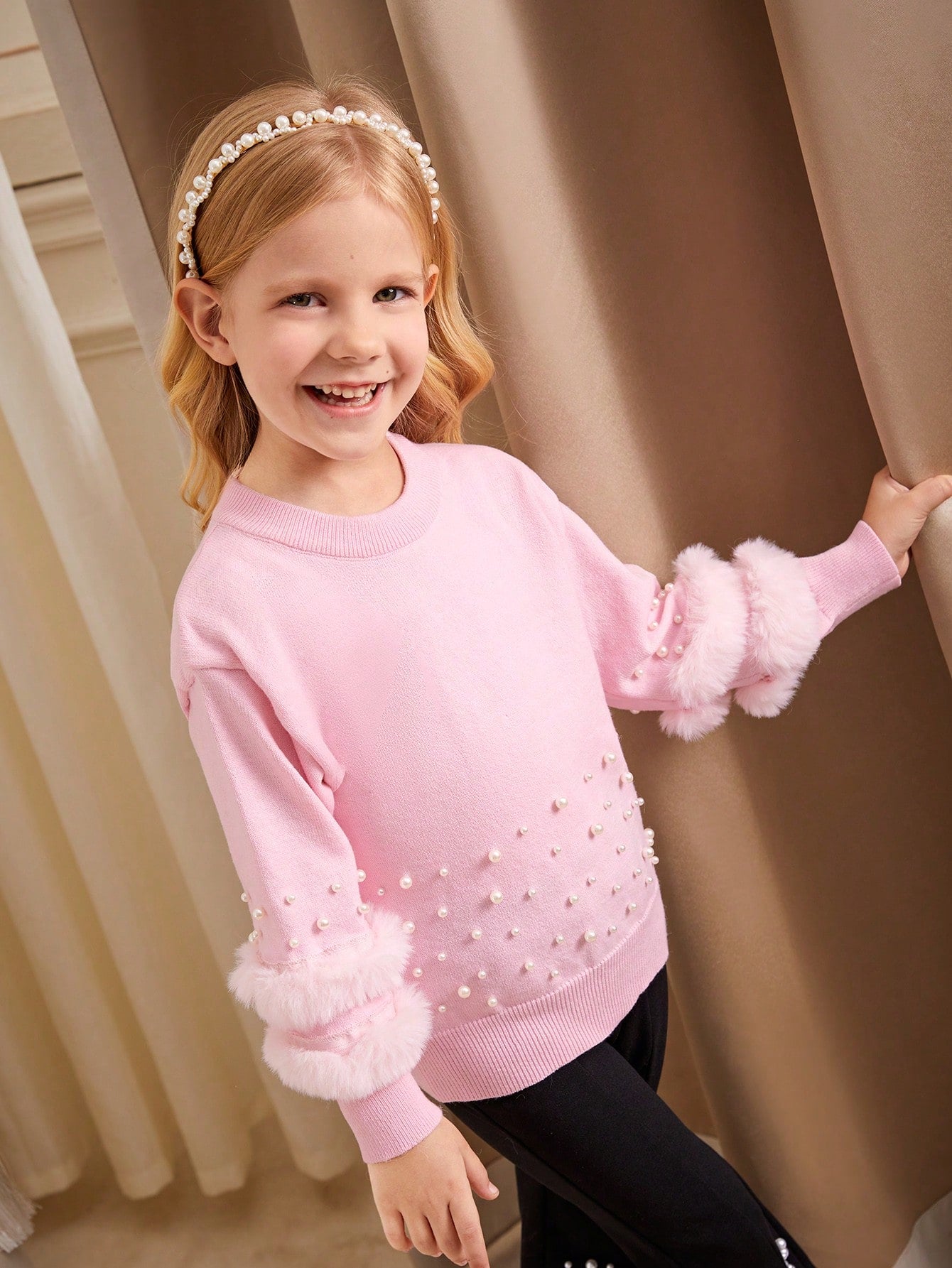 Young Girls' Ruffled Hem Knit Sweater - Fashionable New Design. The Ruffled Edge Adds A  And Sweet Touch, While The Side Fluffy Fur And Pearl Accents Make The Girl Look Elegant And Graceful Like A Princess. The Soft Pink Tone Is Warm And Gentle, Suitable