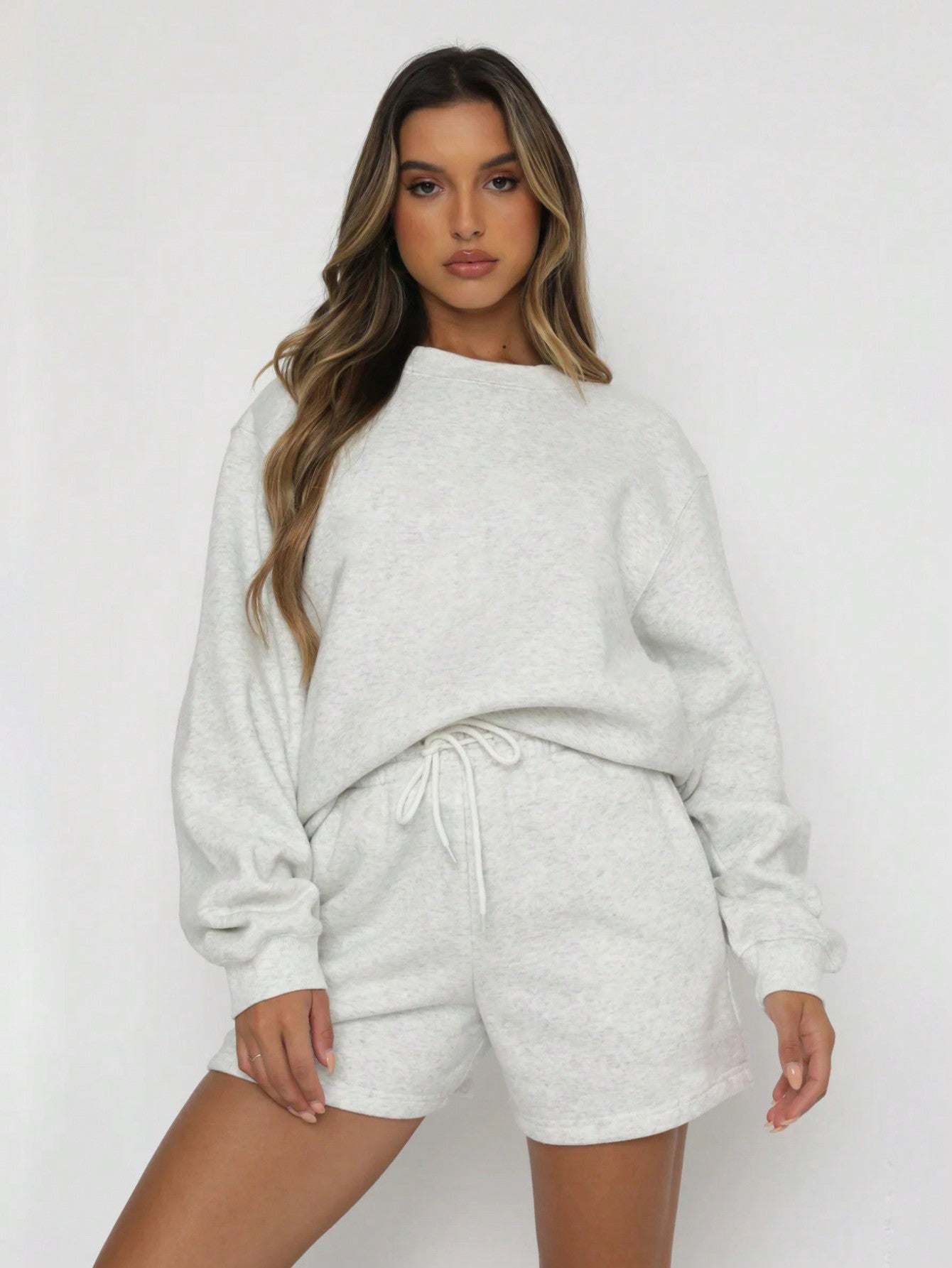 Women's Casual Solid Color Drop Shoulder Long Sleeve Sweatshirt And Shorts Set