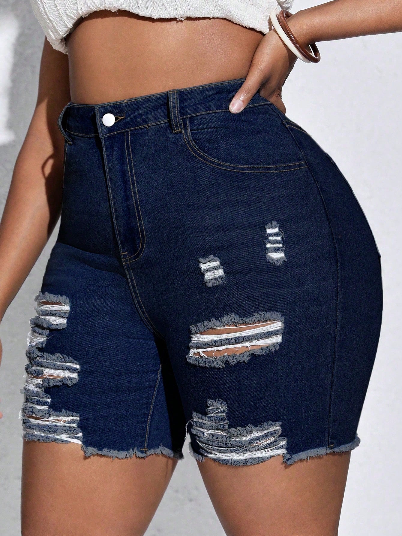 Plus High Waist Ripped Raw Hem Denim Shorts