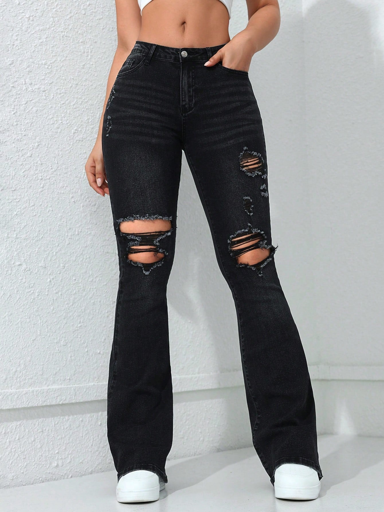 Women's Slim Fit Flared Jeans With Distressed Details